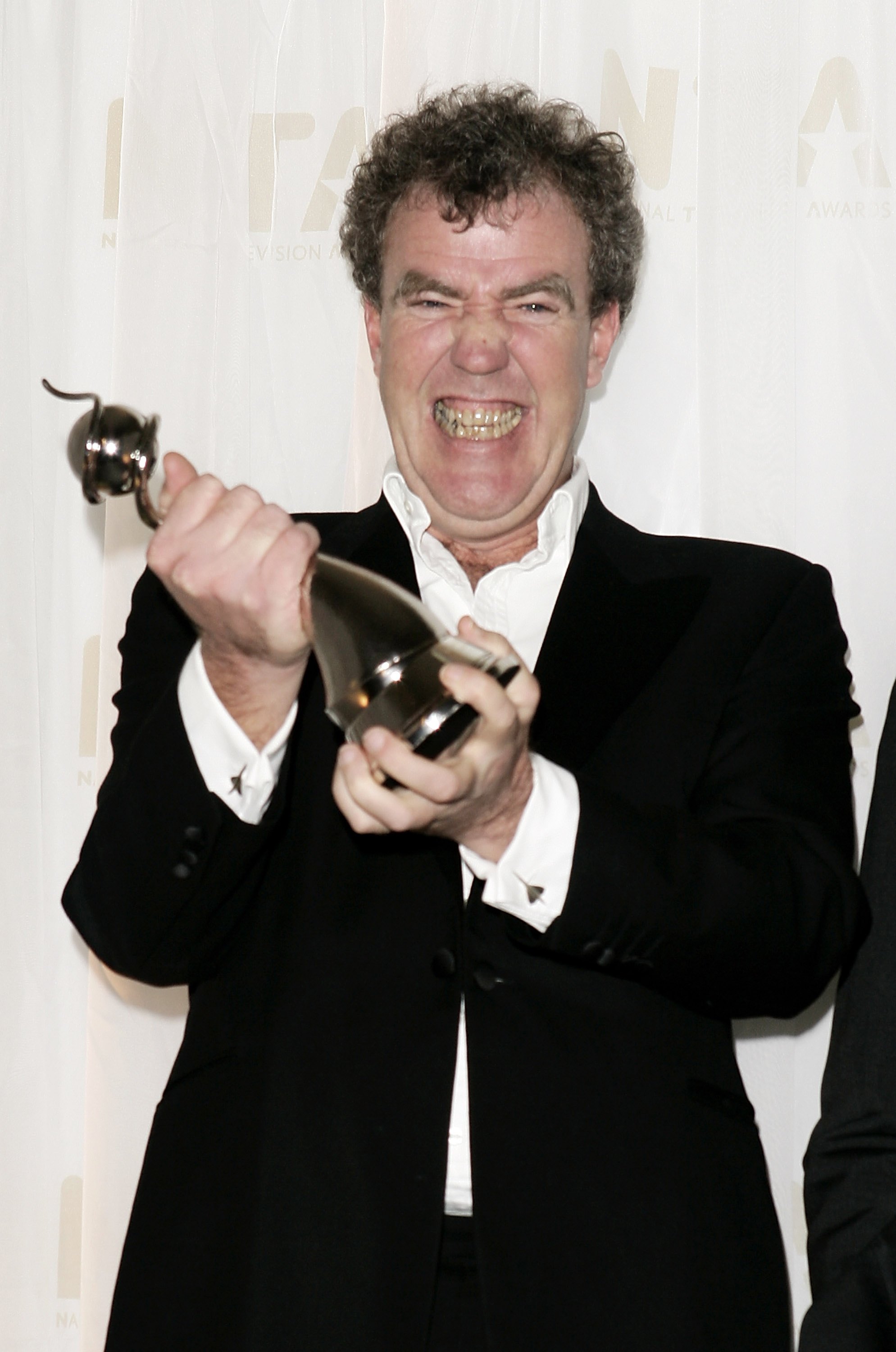 Jeremy Clarkson poses with the award for Most Popular Factual Programme for "Top Gear" on October 31, 2006 | Source: Getty Images