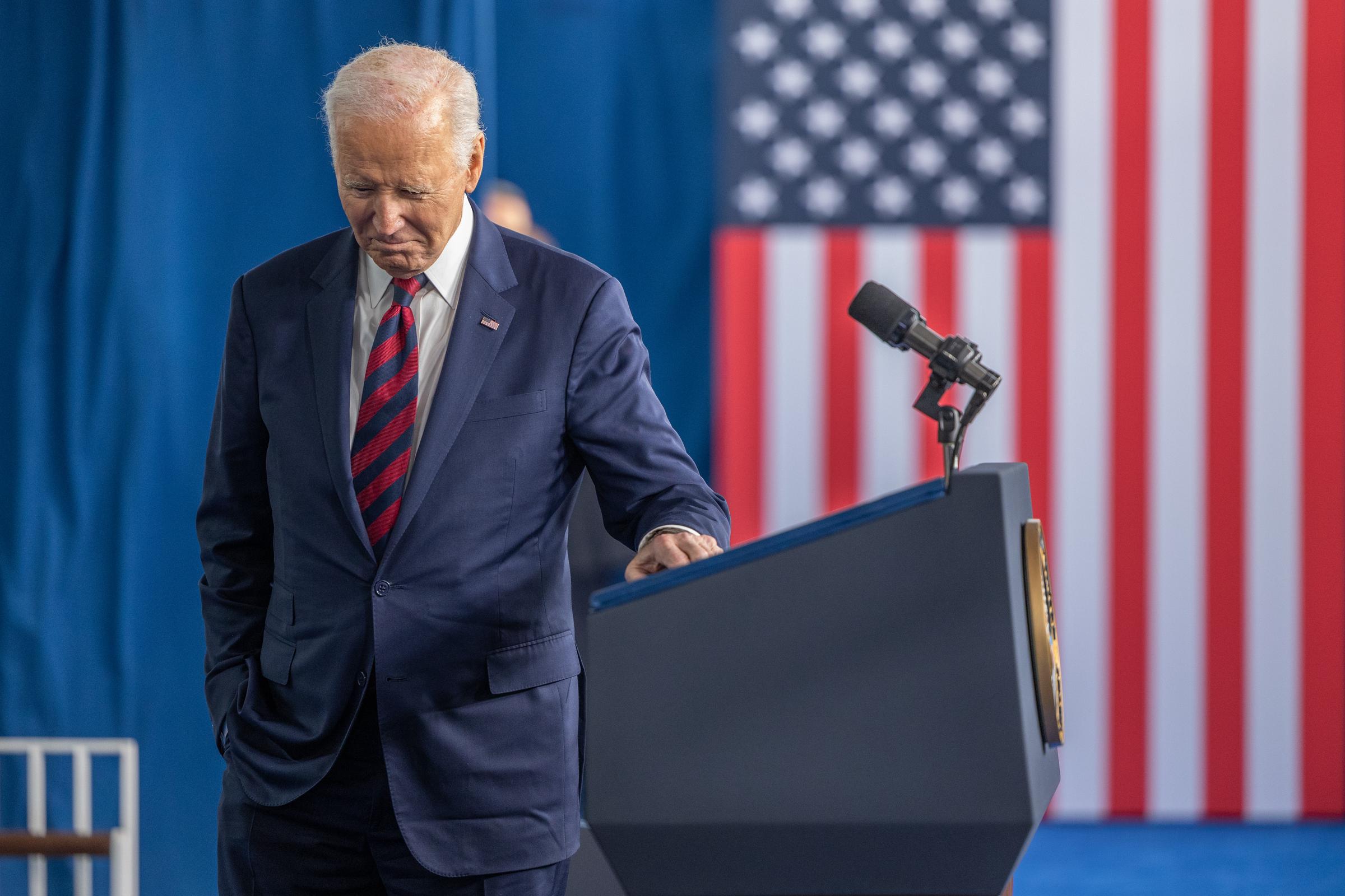 Then-U.S. President Joe Biden pauses as a gospel choir performs at the International African American Museum in Charleston, South Carolina, on January 19, 2025 | Source: Getty Images