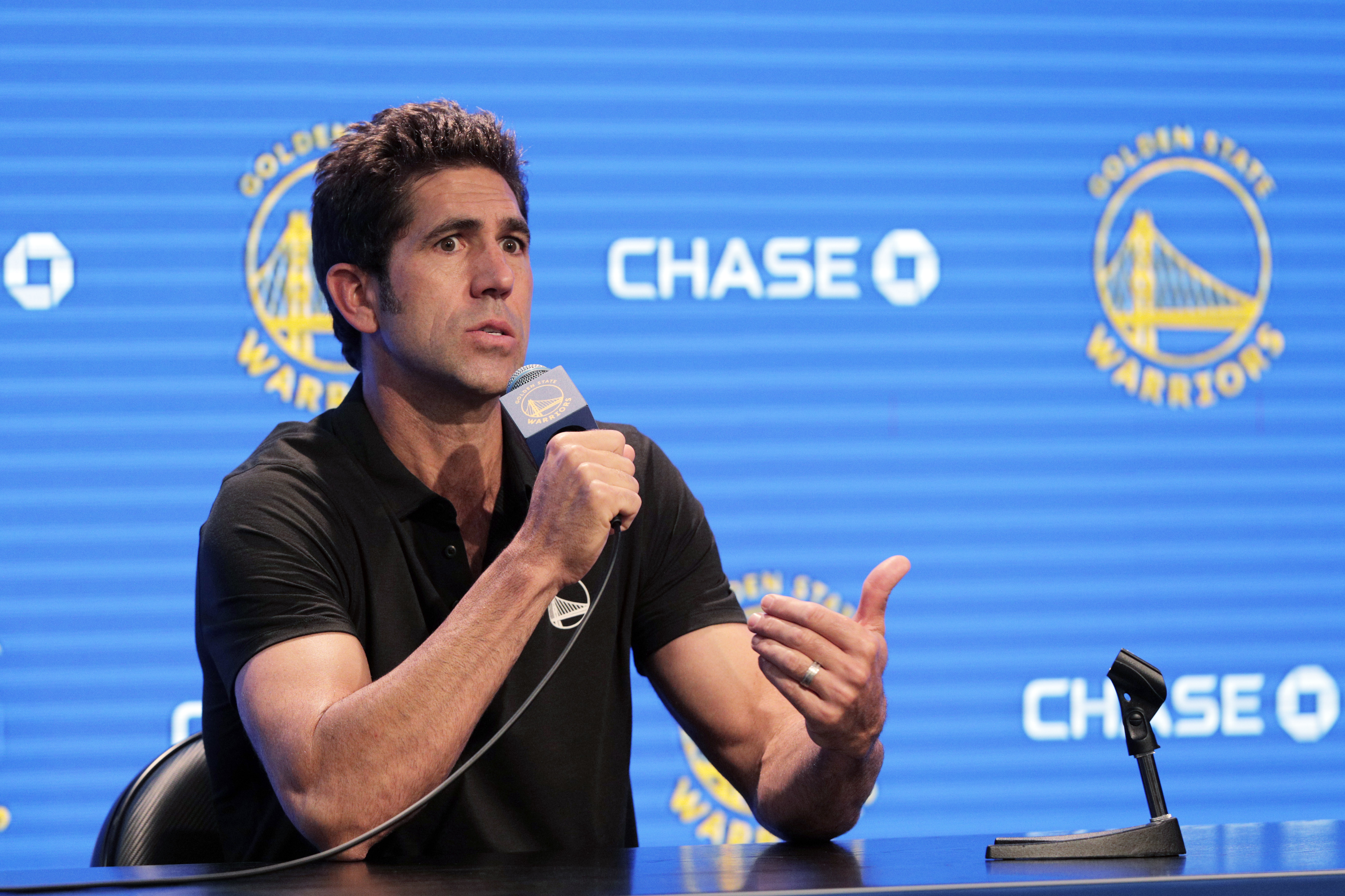 Bob Myers answers questions from reporters as the Golden State Warriors held their media day for the 2021-22 season at Chase Center on September 27, 2021, in San Francisco, California. | Source: Getty Images