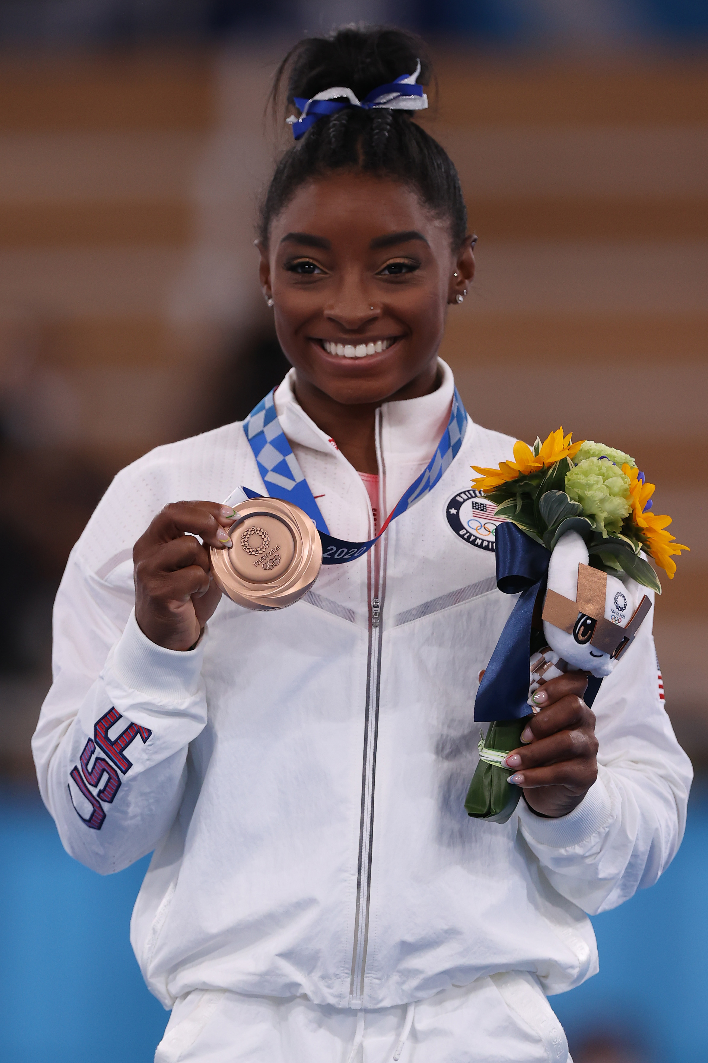 Simone Biles poses with her bronze medal during the Women's Balance Beam Final medal ceremony at the Tokyo 2020 Olympic Games on August 3, 2021, in Tokyo, Japan | Source: Getty Images