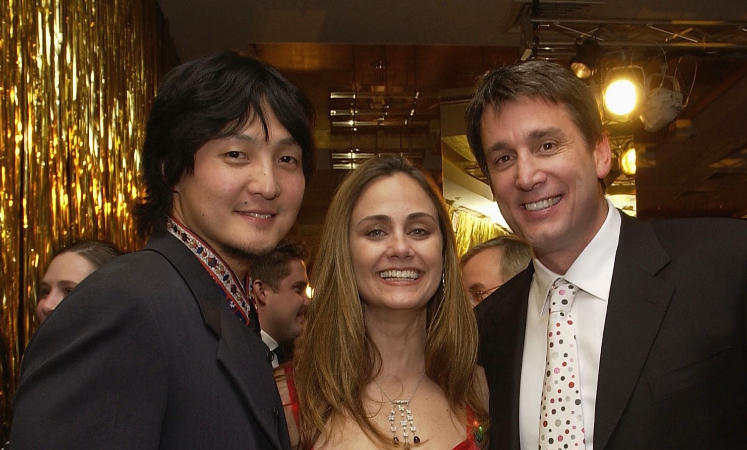 Seung Chung, Diane Farr and Cam Neely attend the Cam Neely Foundation For Cancer Celebrity Fundraiser at The Charles Hotel, February 26, 2005, in Cambridge, Massachusetts. | Source: Getty Images