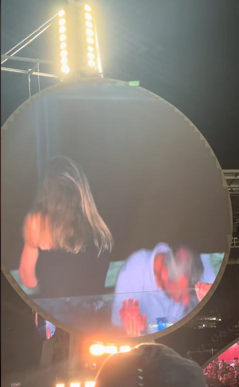 Andy Byron ducking out of the camera's frame as Kristin Cabot turns her back to the camera, from a video post dated July 17, 2025 | Source: TikTok/instaagraace