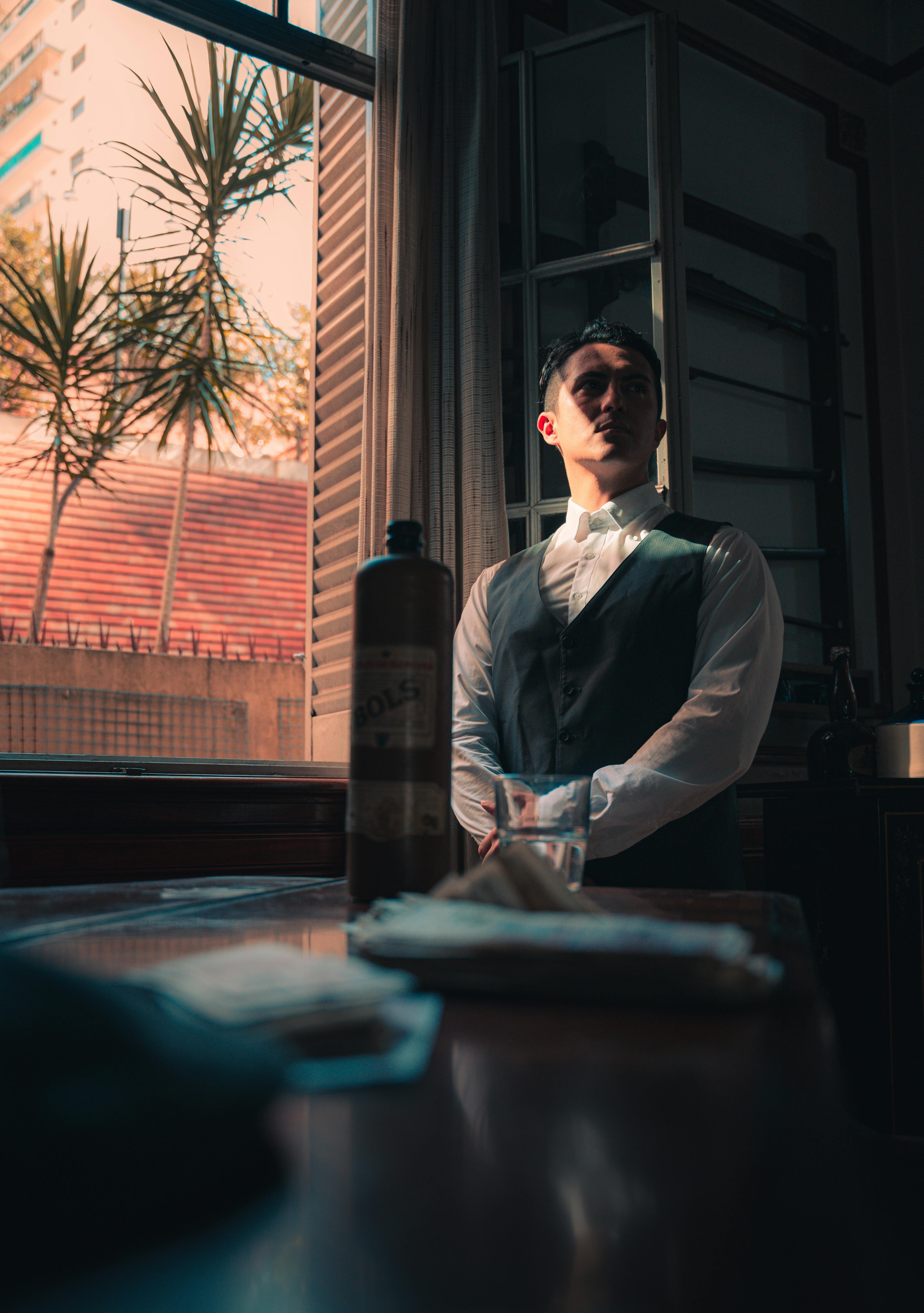 A man standing by the window | Source: Pexels