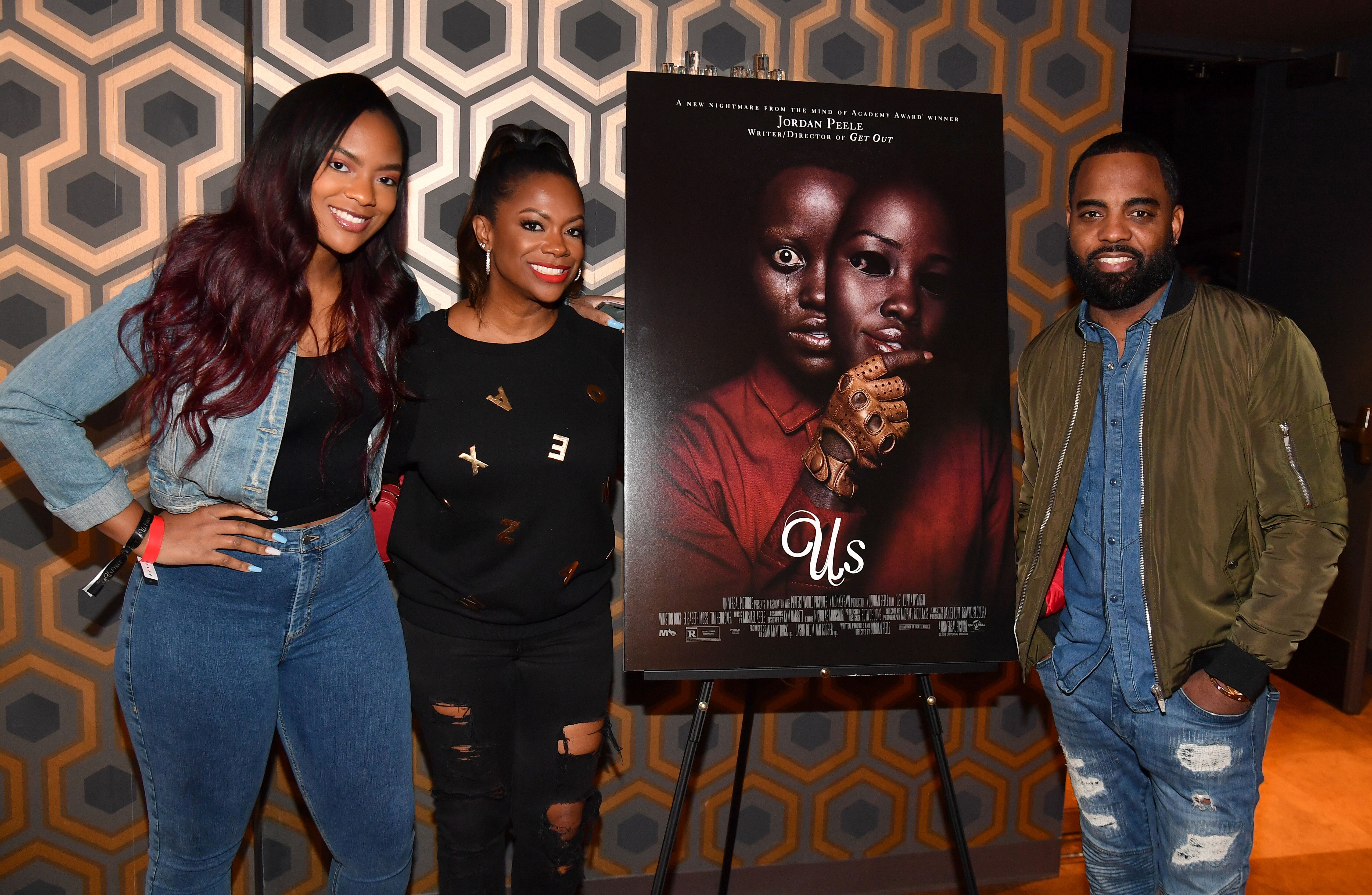 Kandi Burruss, husband Todd Tucker and daughter Riley at the premier of "Us"/ Source: Getty Images