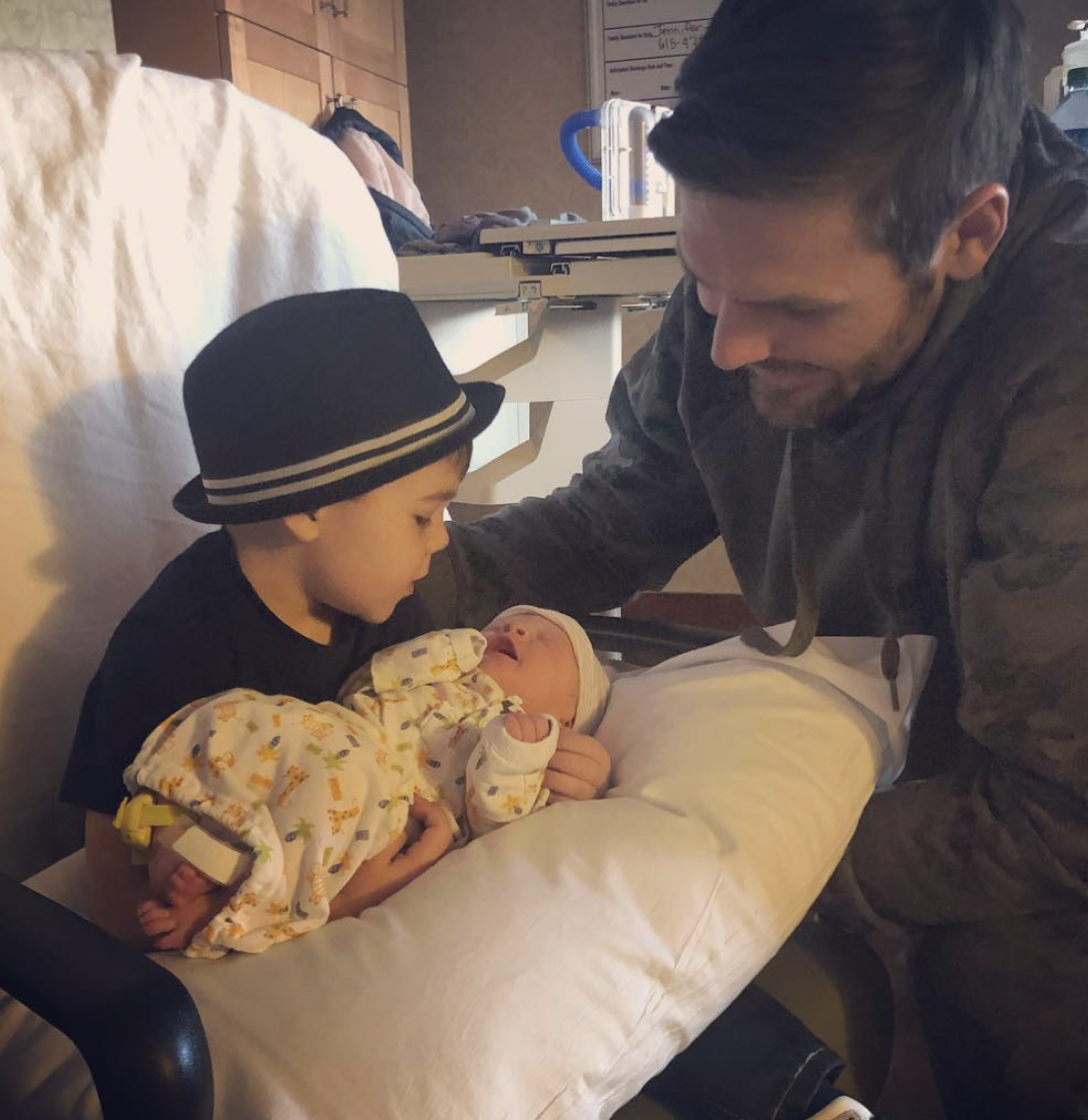 Isaiah, Jacob, and Mike Fisher pictured at the hospital, dated January 2019 | Source: Instagram/carrieunderwood