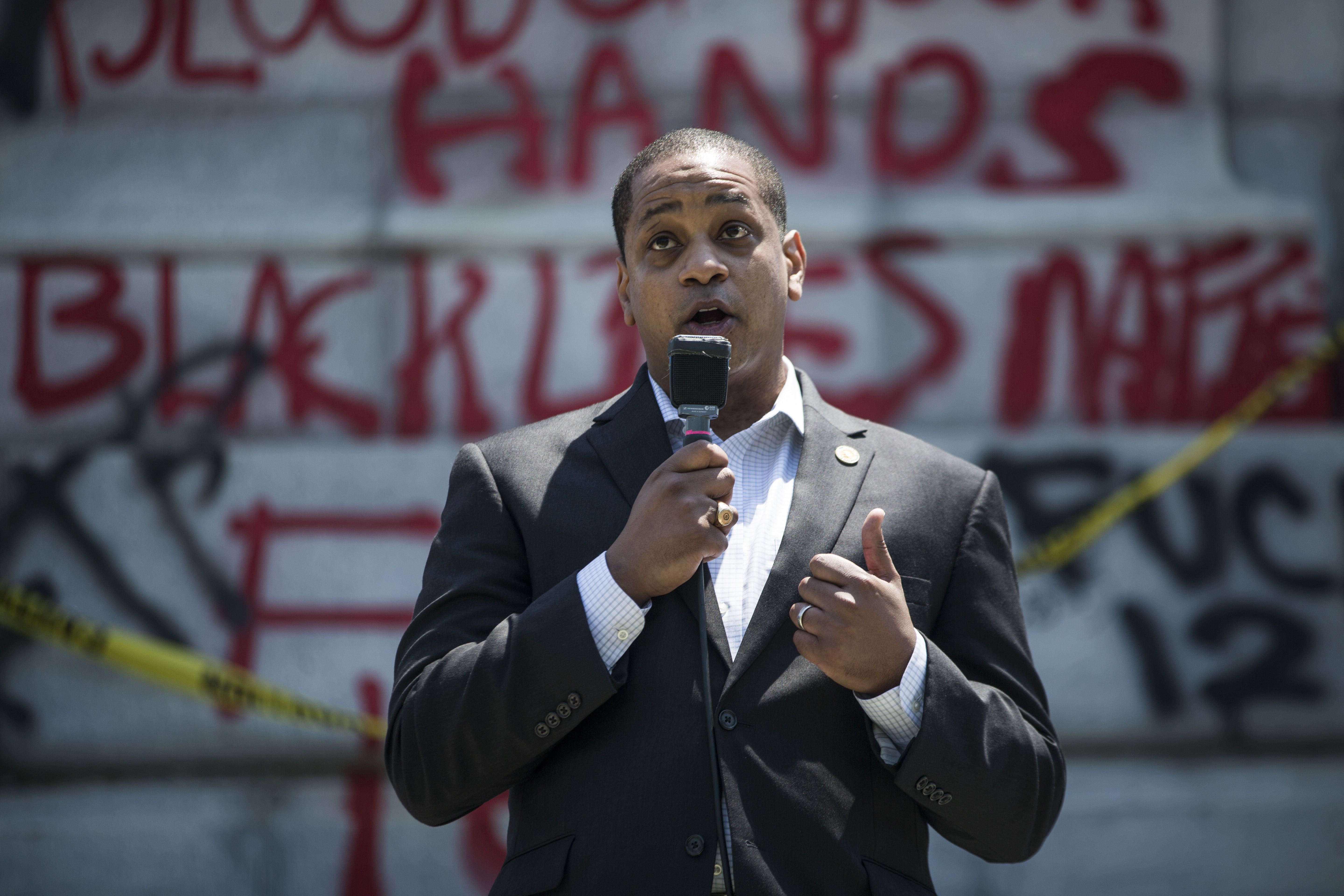 Virginia Lieutenant Gov. Justin Fairfax speaks to demonstrators in front of a statue of Confederate General Robert E. Lee is pictured on June 4, 2020 in Richmond, Virginia. | Source: Getty Images