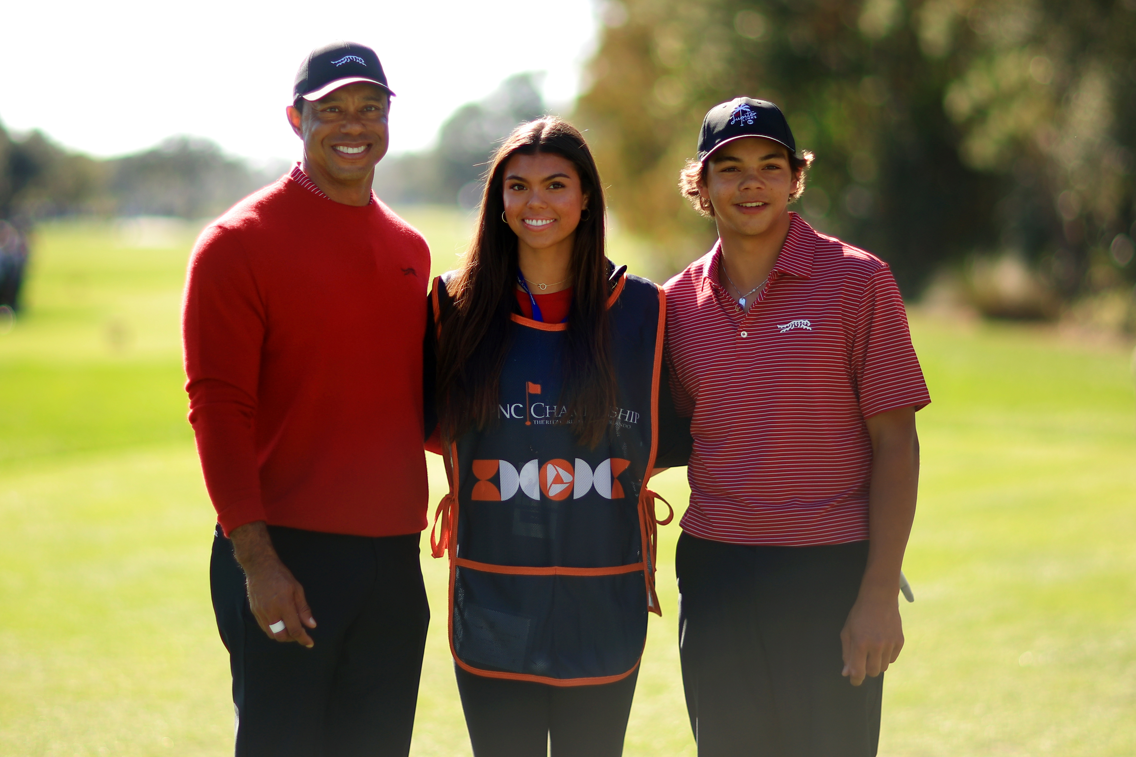 Tiger, Sam, and Charlie Woods stand on the first tee during the second round of the PNC Championship at Ritz-Carlton Golf Club in Orlando, Florida, on December 22, 2024 | Source: Getty Images