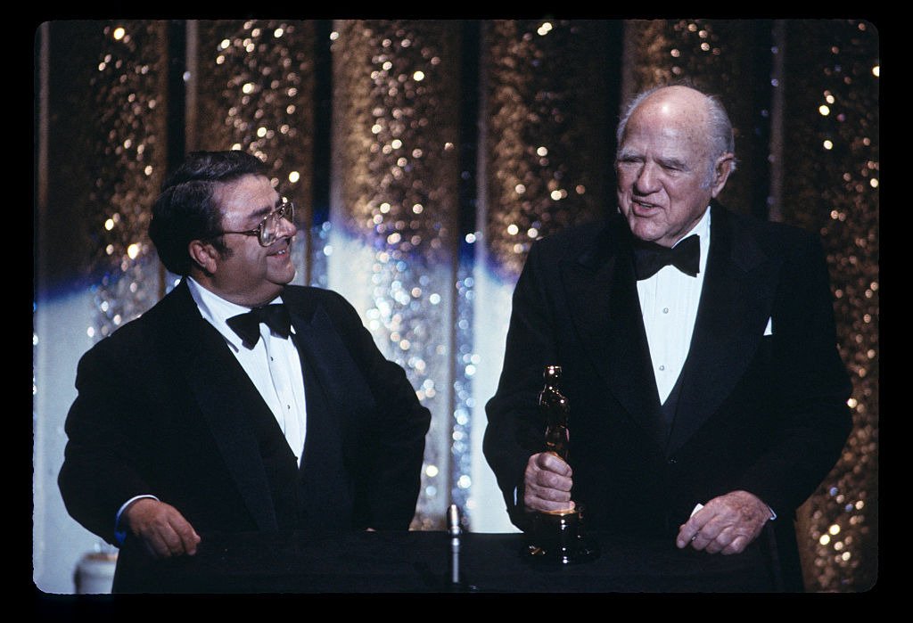 HAL ROACH (R), RECIPIENT OF HONORARY ACADEMY AWARD WITH PRESENTER GEORGE MCFARLAND -- April 09, 1984 | Photo: Getty Images