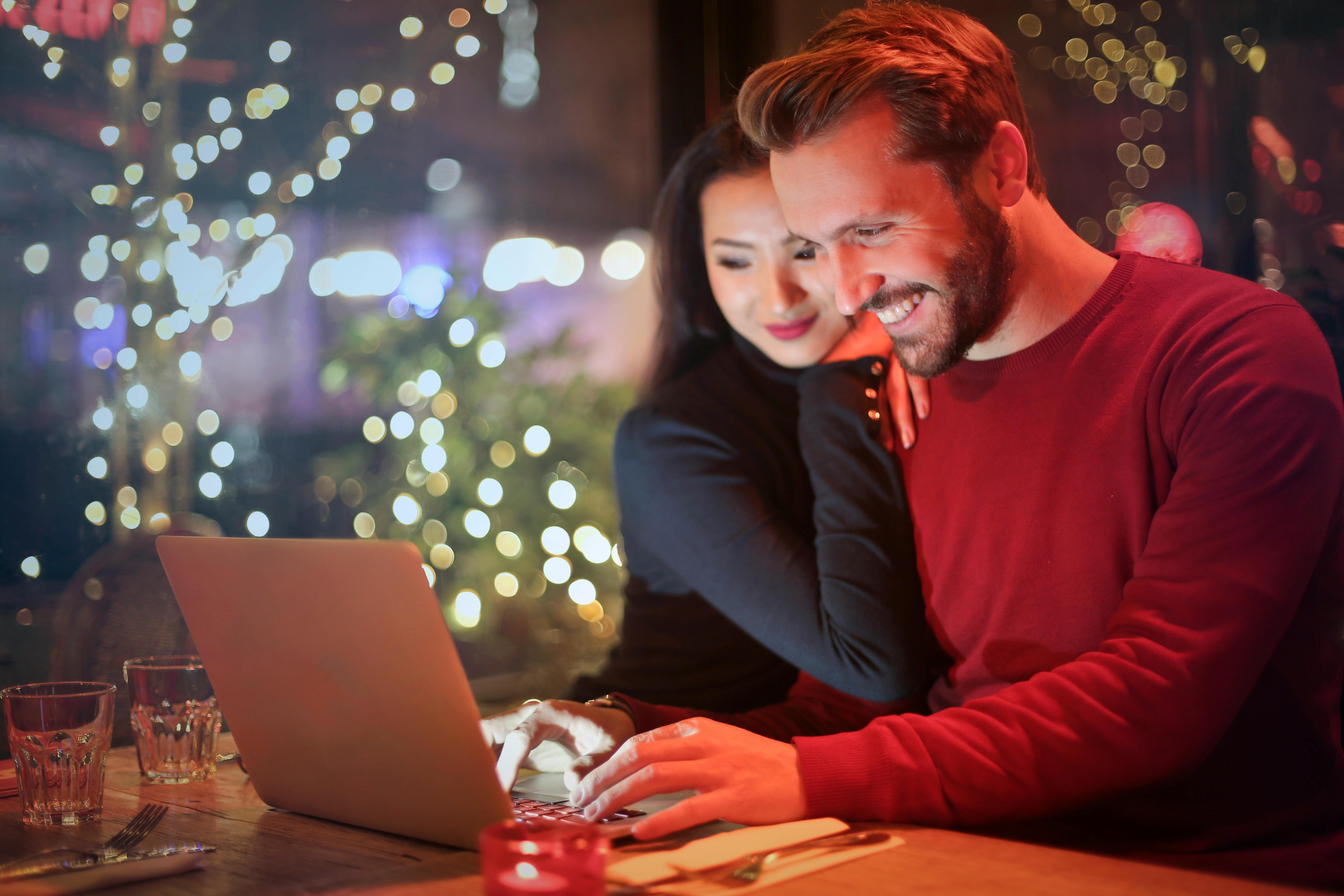 A couple looking at things on a laptop | Source: Pexels