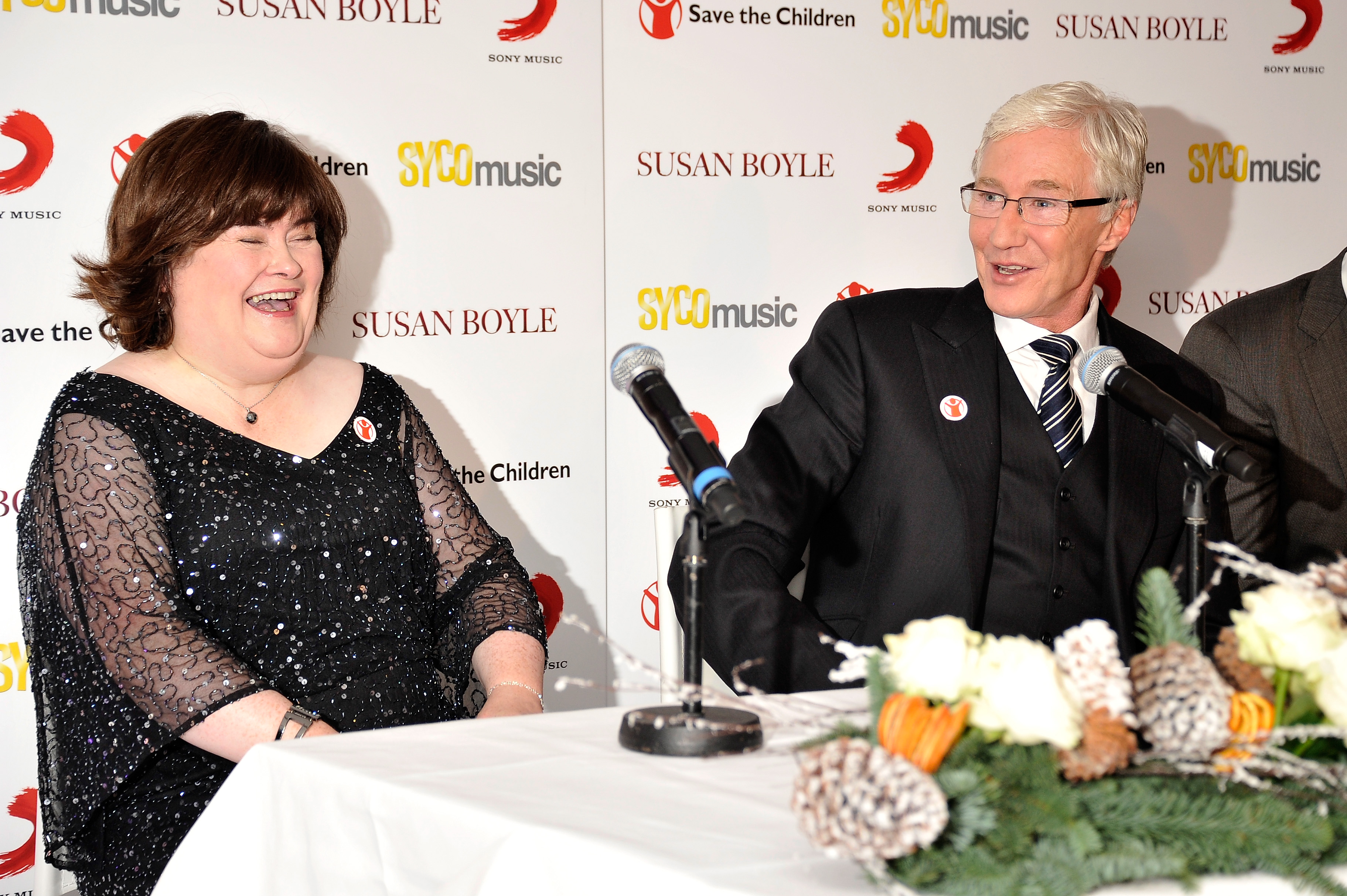 Susan Boyle and Paul O' Grady attend a photocall on October 28, 2013 in London, England | Source: Getty Images
