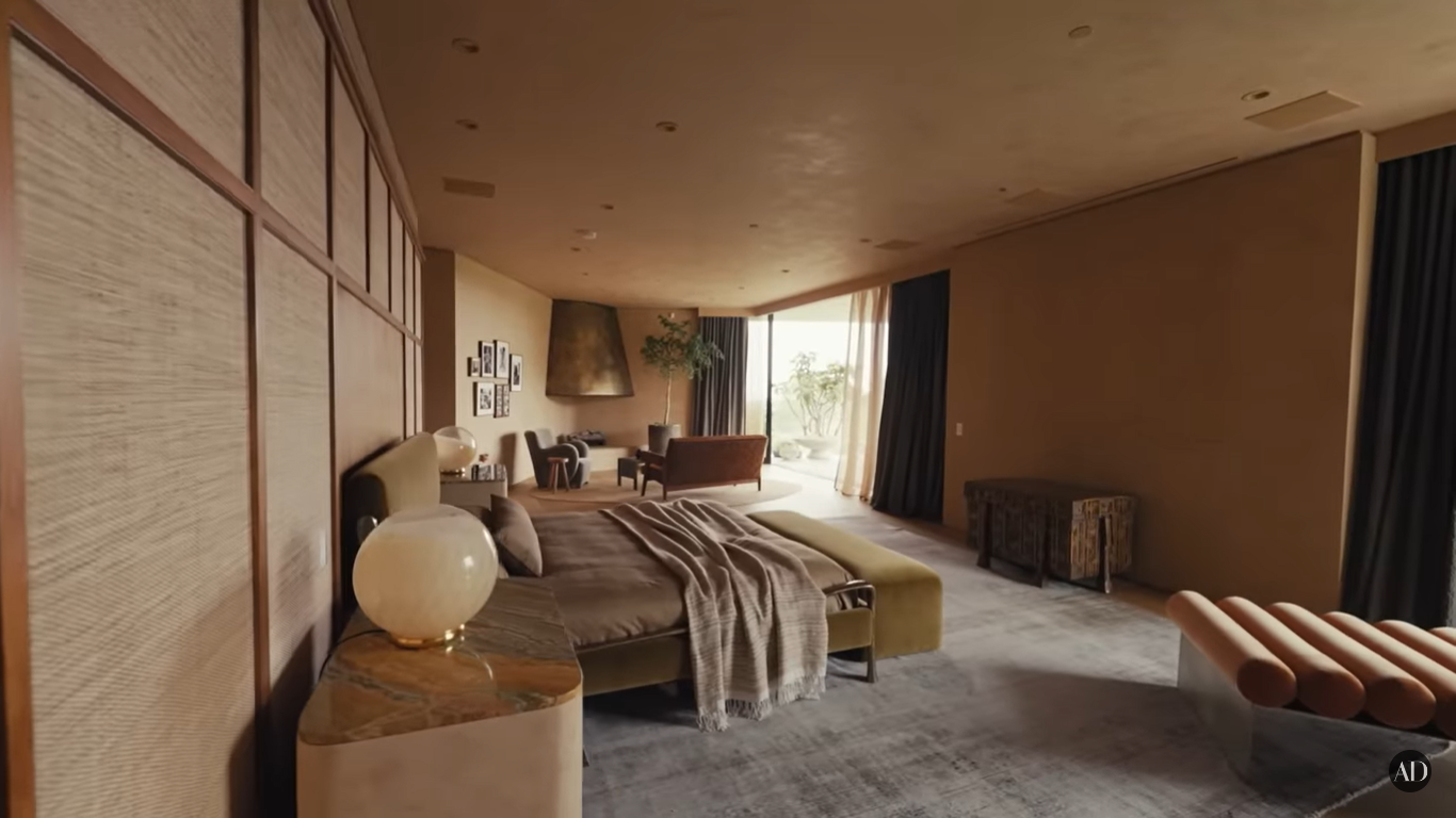 Chrissy Teigen and John Legend's master bedroom at their Beverly Hills home | Source: YouTube/ArchitecturalDigest