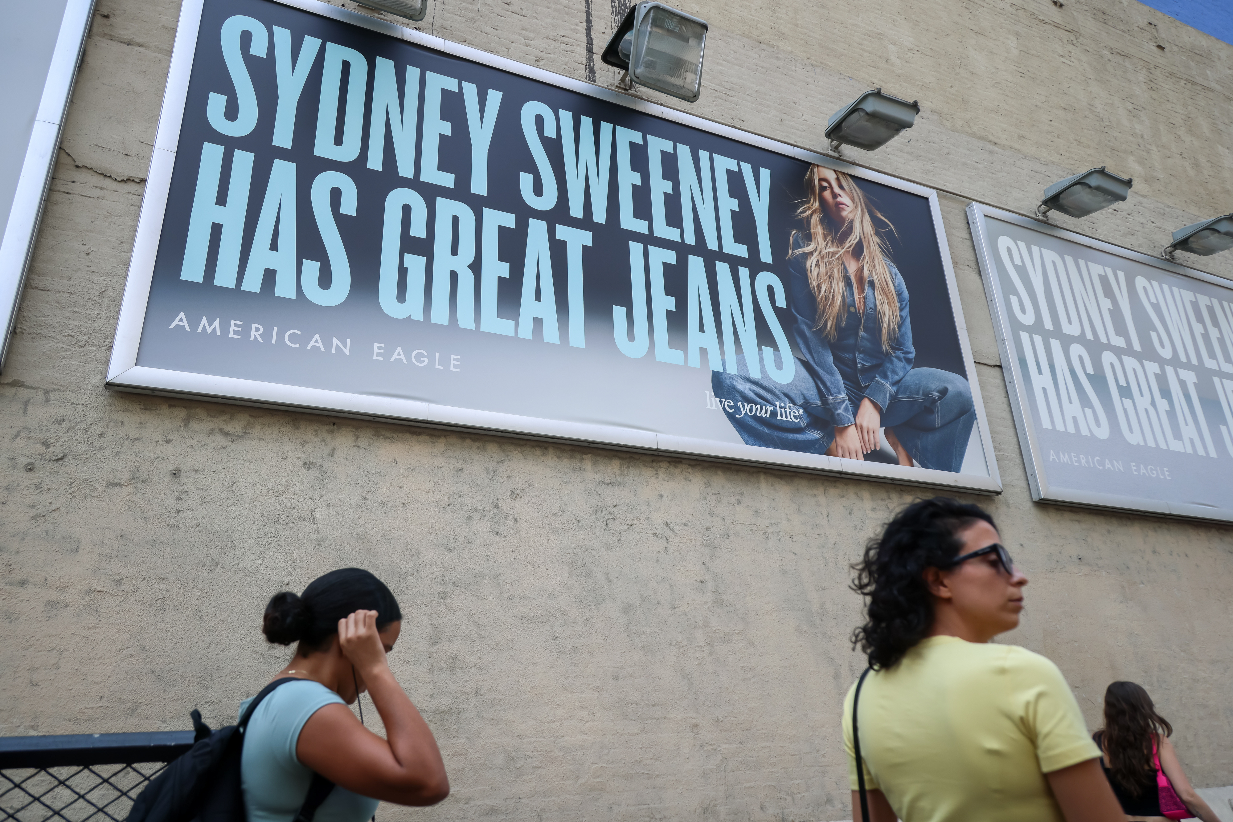 A different angle of an American Eagle billboard featuring Sydney Sweeney's campaign in New York. | Source: Getty Images