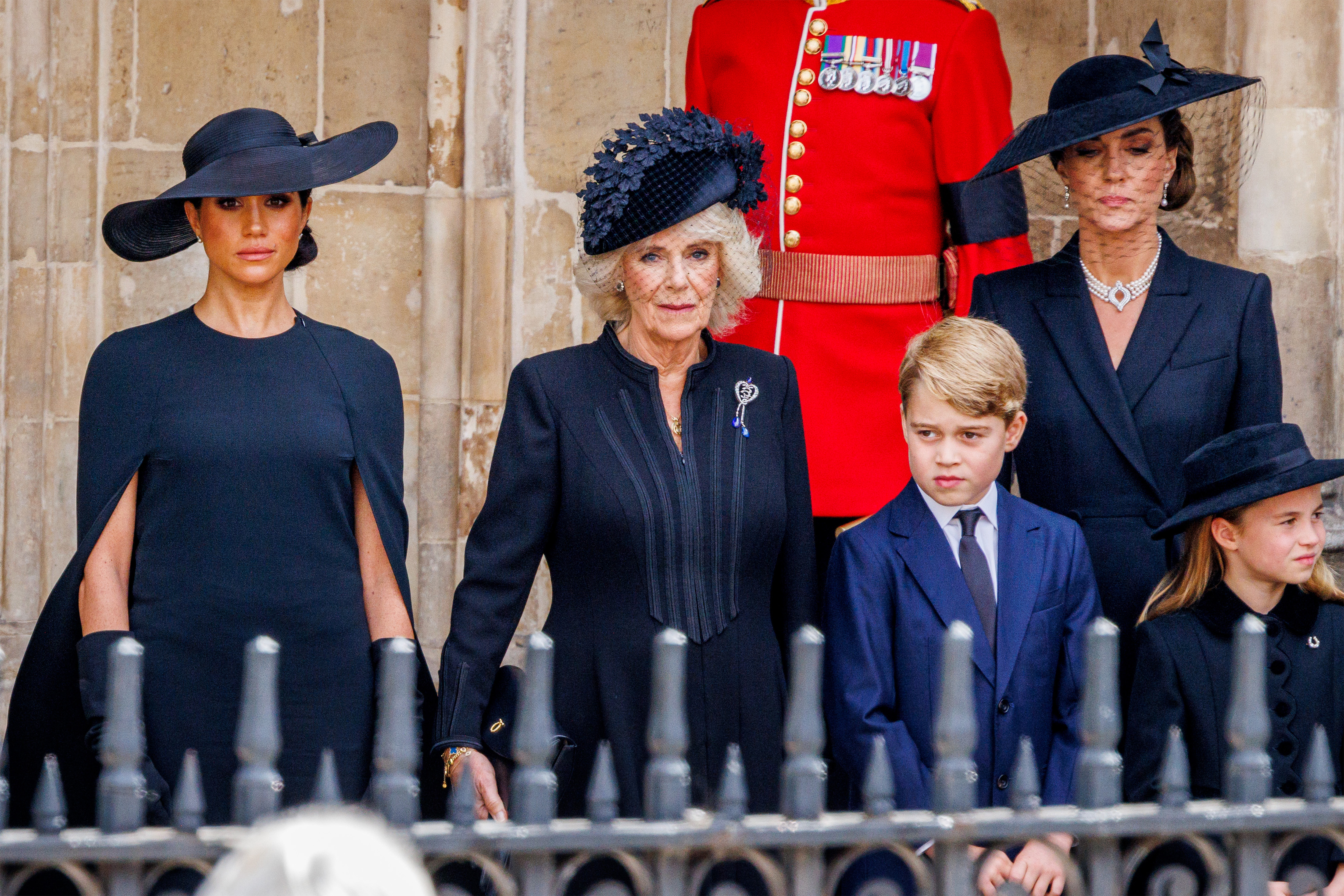 Meghan Markle, Queen Camilla, Prince George, Princess Charlotte, and Princess Catherine at the State Funeral of Queen Elizabeth II at Westminster Abbey on September 19, 2022 in London, England | Source: Getty Images