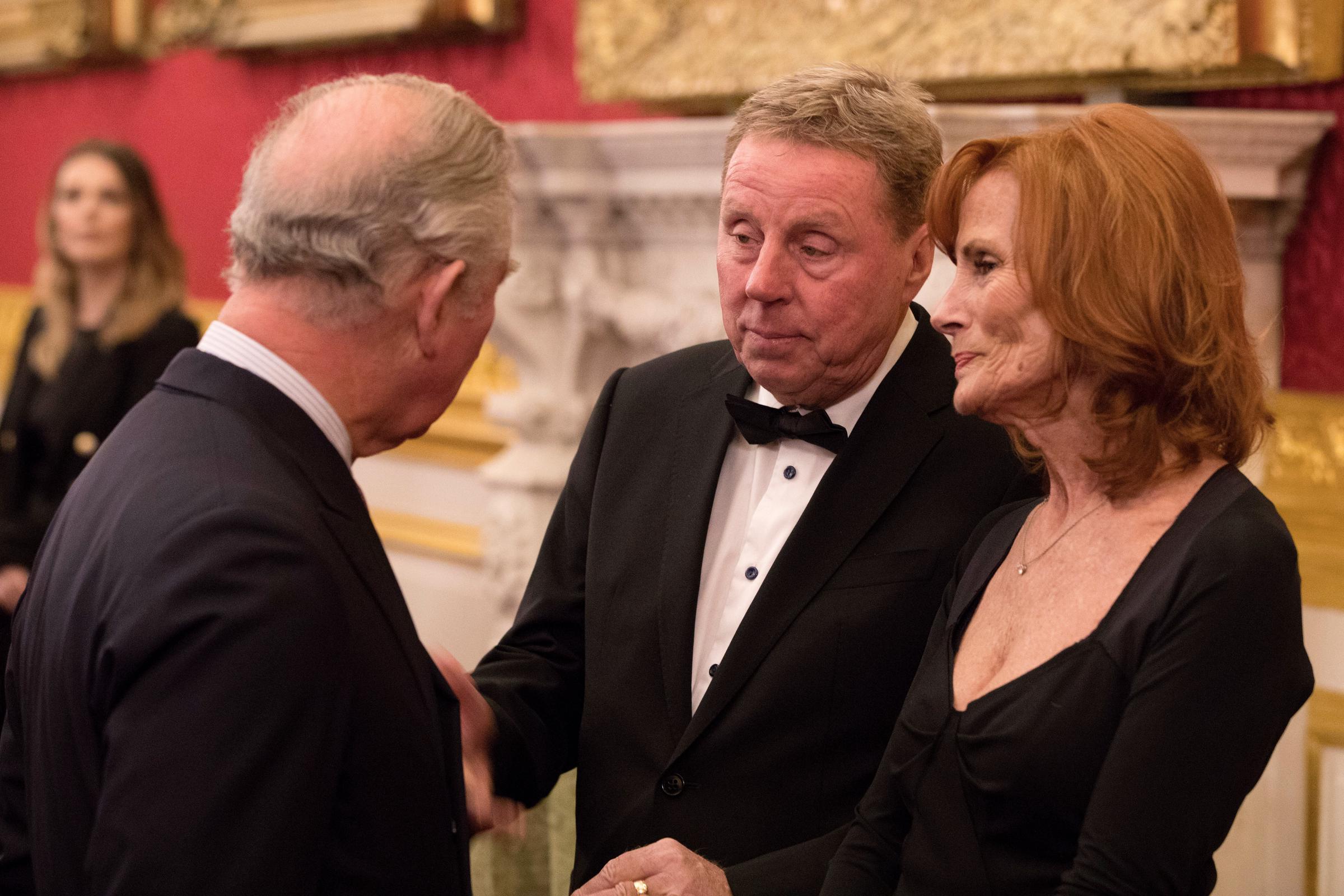 King Charles III, then the Prince of Wales, greeted Harry and Sandra Redknapp at St James's Palace on 8 February 2018, where the couple attended The Prince's Trust "Invest in Futures" pre-dinner reception, dressed in formal evening wear as they joined guests to mark the first anniversary of the Trust's partnership with L'Oréal Paris.