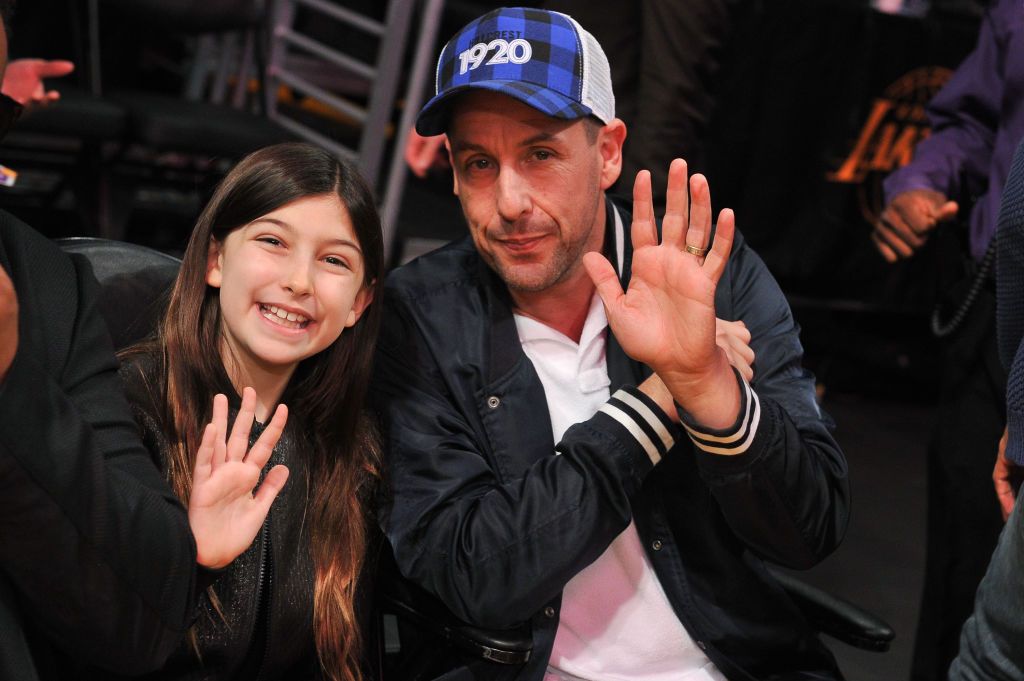 Adam Sandler and Sunny Madeline Sandler during a basketball game between the Los Angeles Lakers and the Portland Trail Blazers at Staples Center on November 14, 2018, in Los Angeles, California. | Source: Getty Images