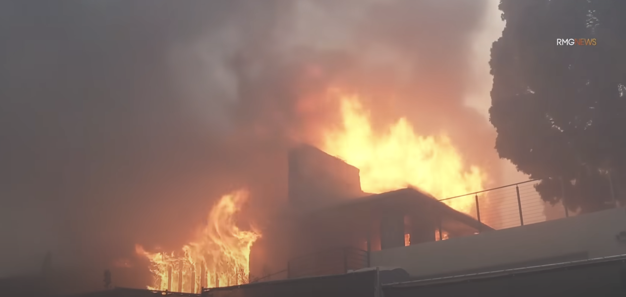 A house engulfed in flames on January 7, 2025, in Los Angeles, California. | Source: YouTube/CBSEveningNews