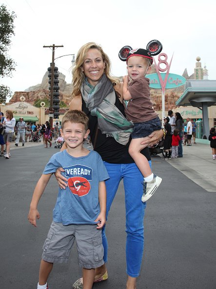 Sheryl Crow and her sons, Wyatt and Levi at Cars Land in Disney California Adventure park on July 25, 2012 in Anaheim, California. | Photo: Getty Images