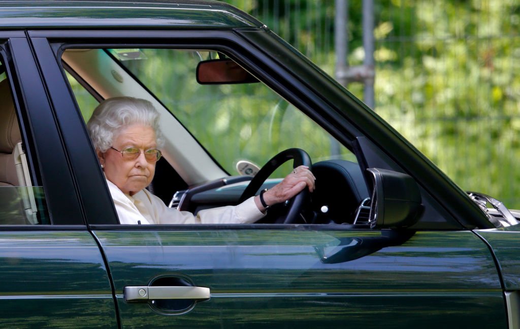 Queen Elizabeth II driving at the International Carriage Driving Grand Prix on May 17, 2014, in Windsor, England | Source: Getty Images