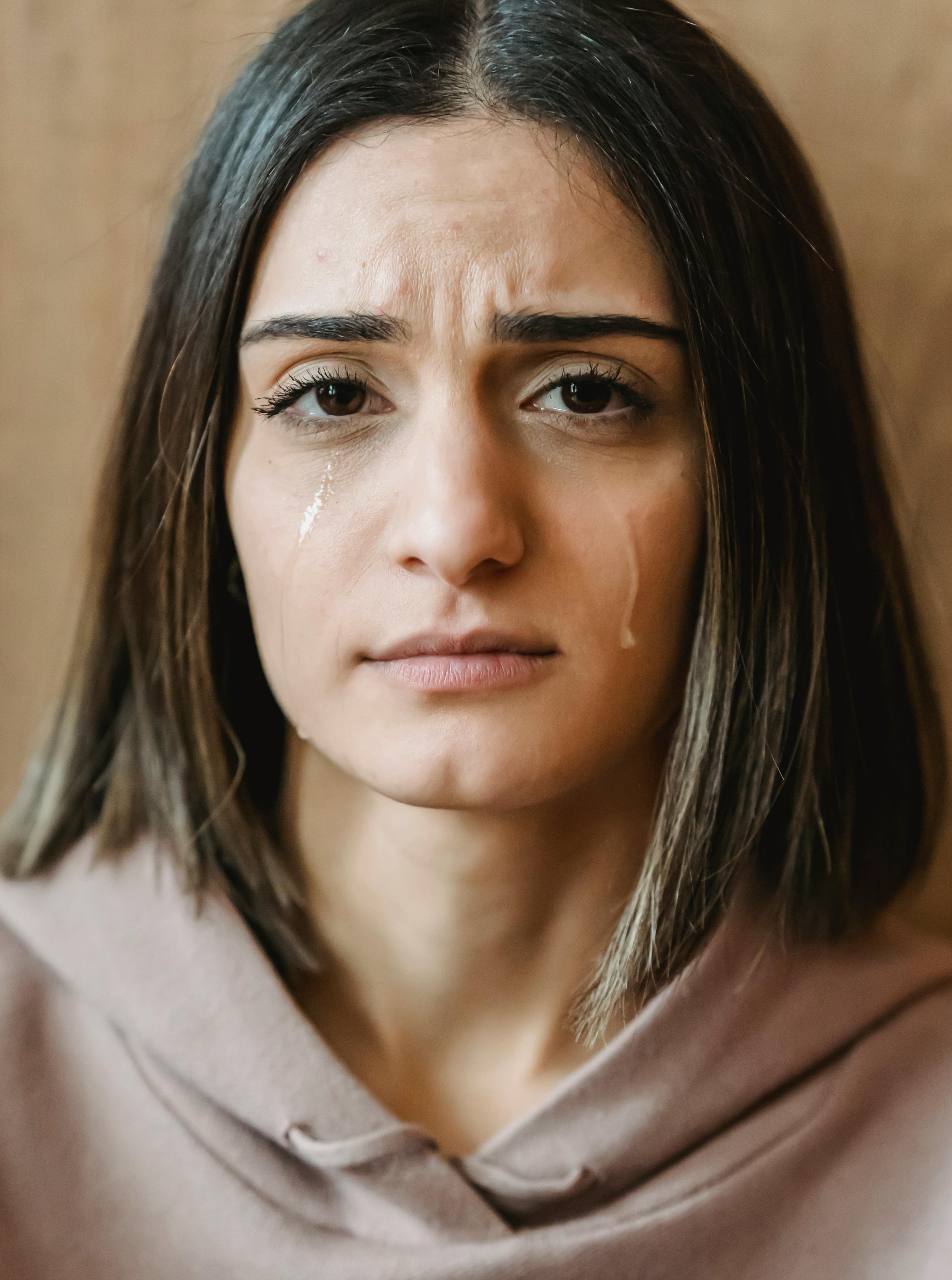 A front shot of a crying young woman | Source: Pexels