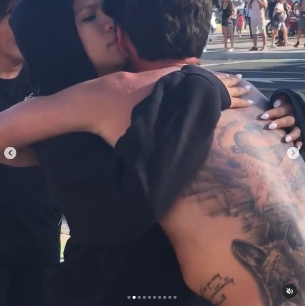 A screenshot of Cassie and Alex Fine sharing a hug, from a post dated August 31, 2020. | Source: Instagram/alexfine44