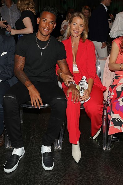 Ina und Dennis Aogo, Marc Cain Fashion Show - Berlin Fashion Week Herbst/Sommer 2020 | Quelle: Getty Images Ina und Dennis Aogo, Marc Cain Fashion Show - Berlin Fashion Week Herbst/Sommer 2020 | Quelle: Getty Images