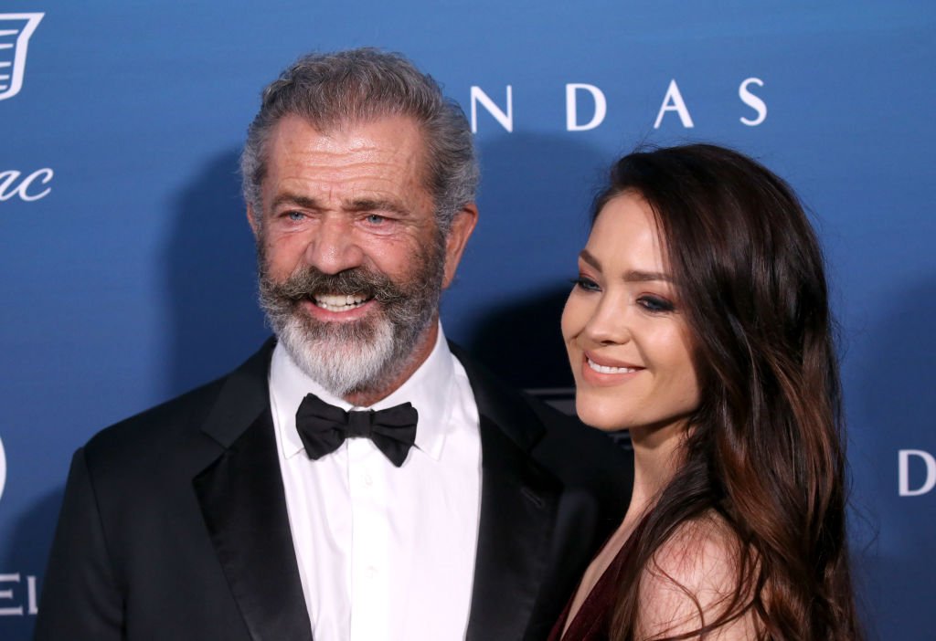 Mel Gibson and Rosalind Ross attend The Art Of Elysium's 12th Annual Celebration - Heaven held | Photo: Getty Images Mel Gibson and Rosalind Ross attend The Art Of Elysium's 12th Annual Celebration - Heaven held | Photo: Getty Images