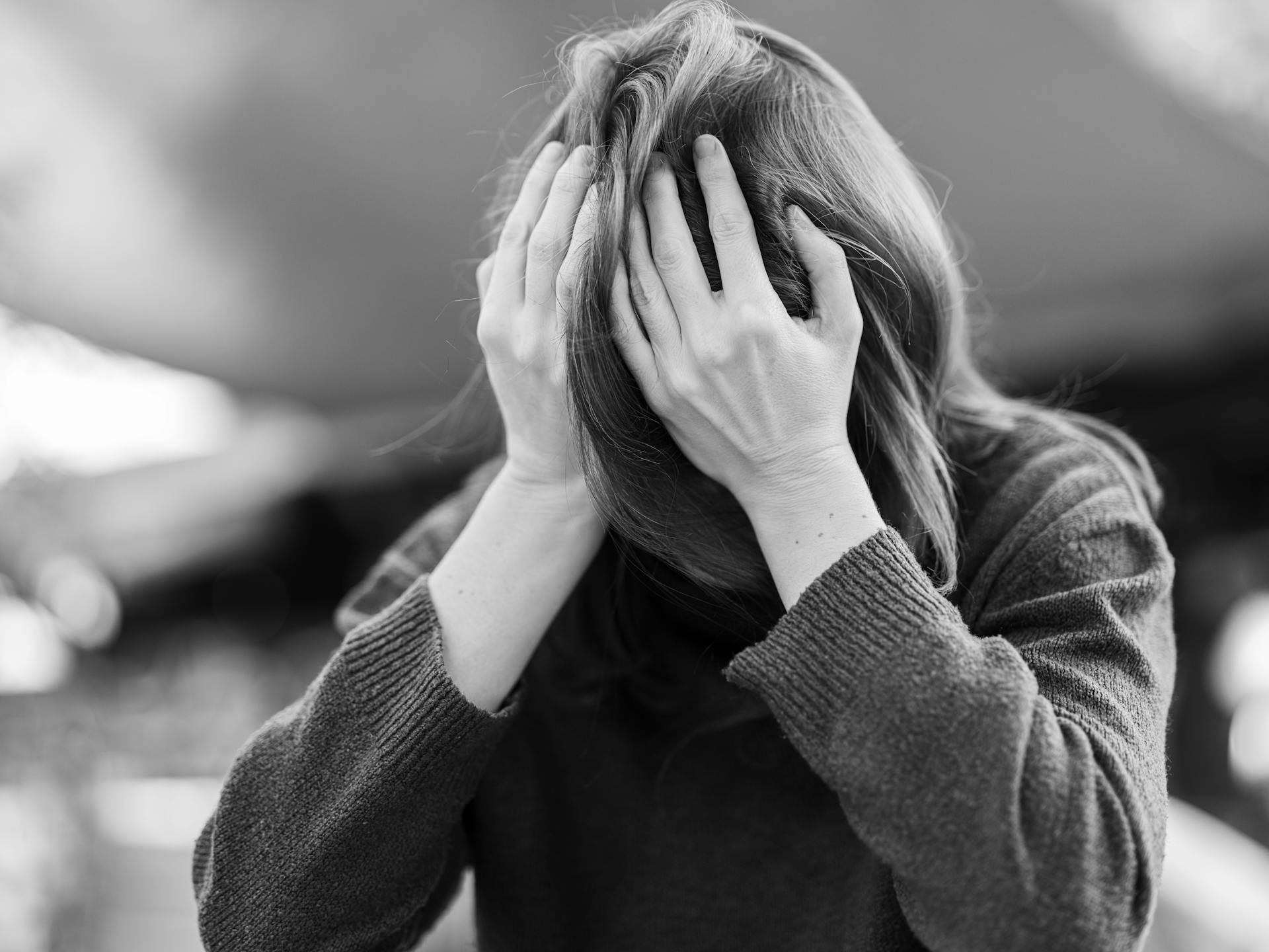 Grayscale photo of a distressed woman | Source: Pexels