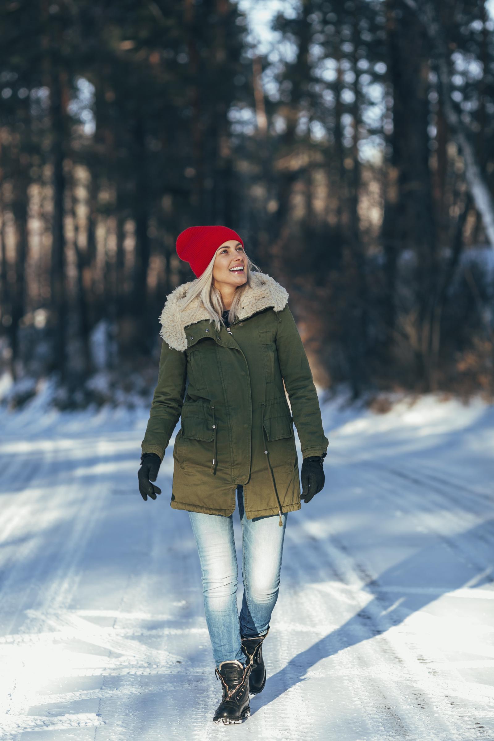 A woman walking in the snow | Source: Getty Images