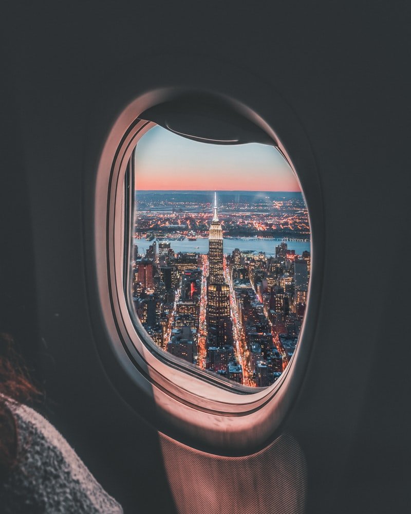 The first gentleman put out his arm and confirmed they were flying over New York. | Photo: Unsplash