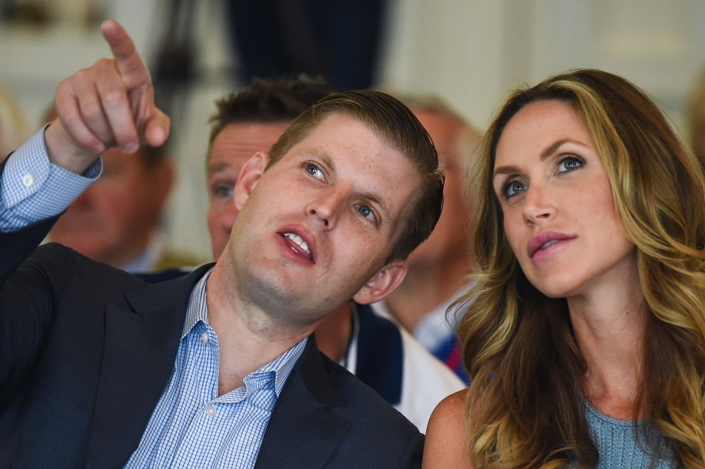 Eric Trump and his wife Lara attend the opening Trump Turnberry's new golf course the King Robert The Bruce course | Photo: Getty Images