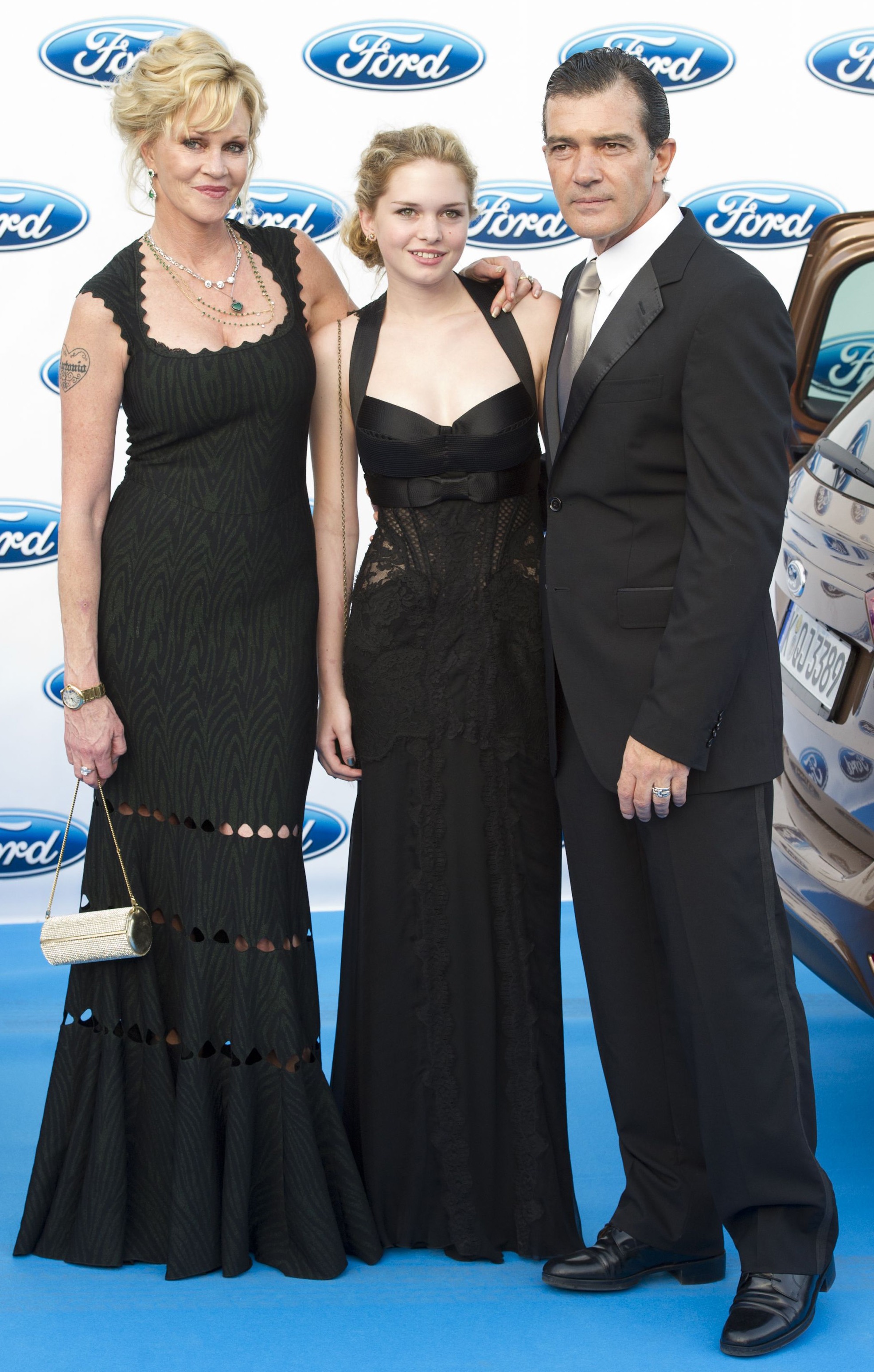 Melanie Griffith, Stella del Carmena, and Antonio Banderas at the Starlite Charity Gala on August 4, 2012, in Marbella, Spain | Source: Getty Images