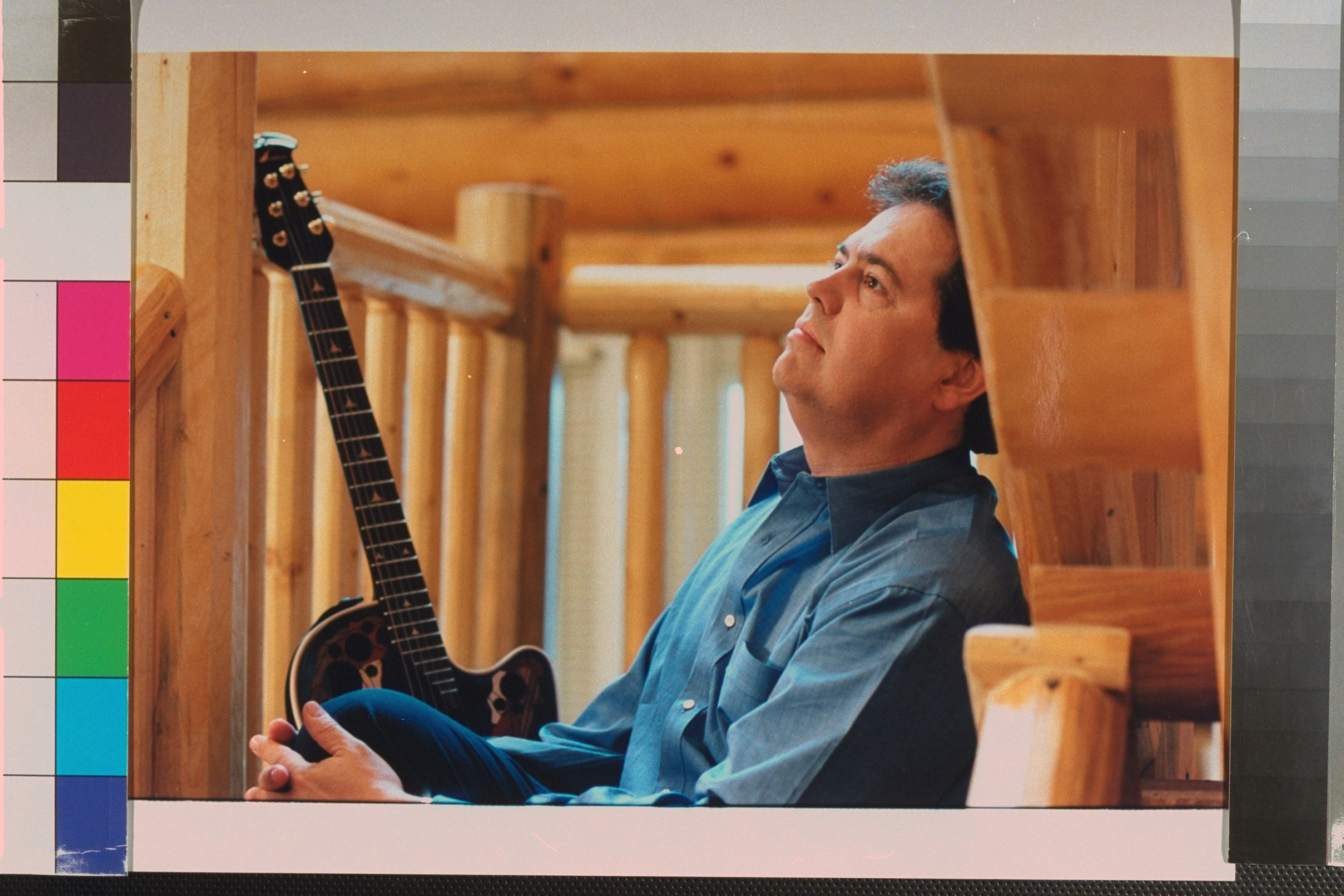 Alan Osmond sitting on porch in front of his ranch in 1995 | Source: Getty Images