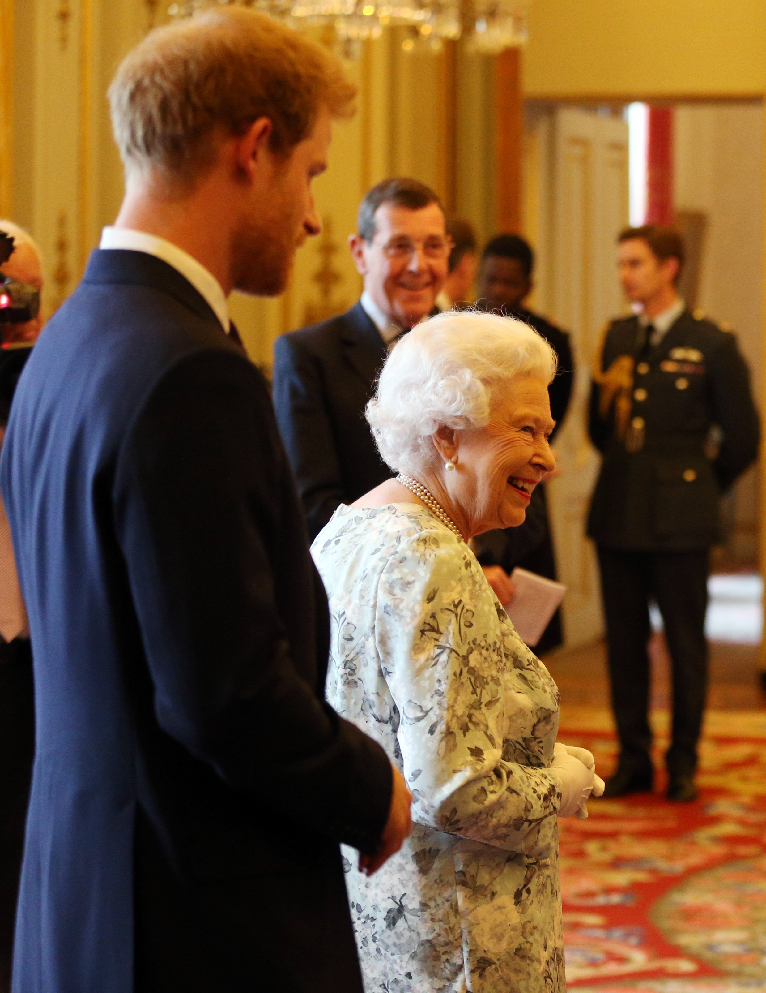 Prince Harry and Queen Elizabeth II during the Queen's Young Leaders Award Ceremony at Buckingham Palace on June 29, 2017, in London, England | Source: Getty Images