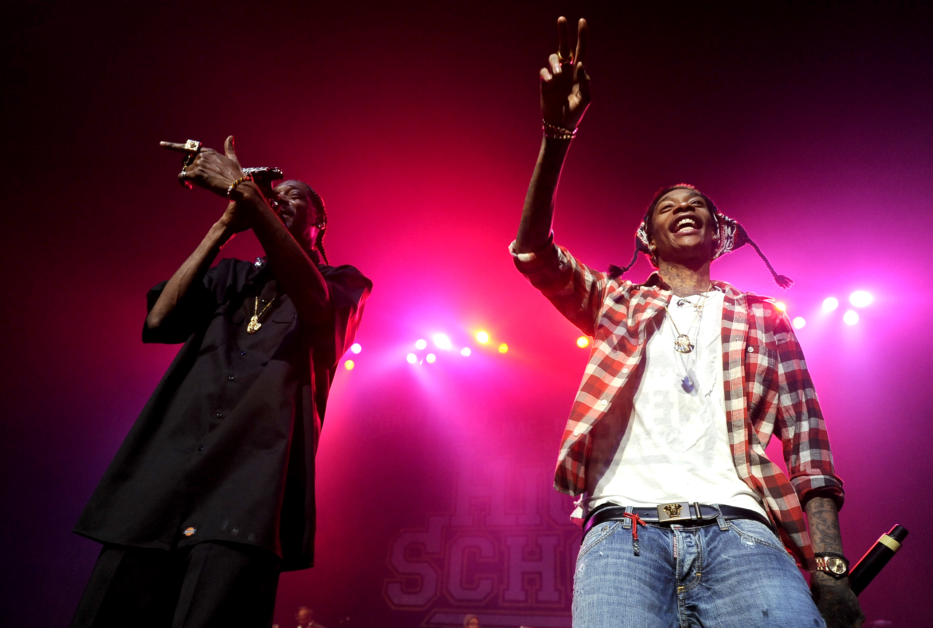 Snoop Dogg and Wiz Khalifa perform during their "High School Tour" at The Warfield on December 12, 2011, in San Francisco, California. | Source: Getty Images