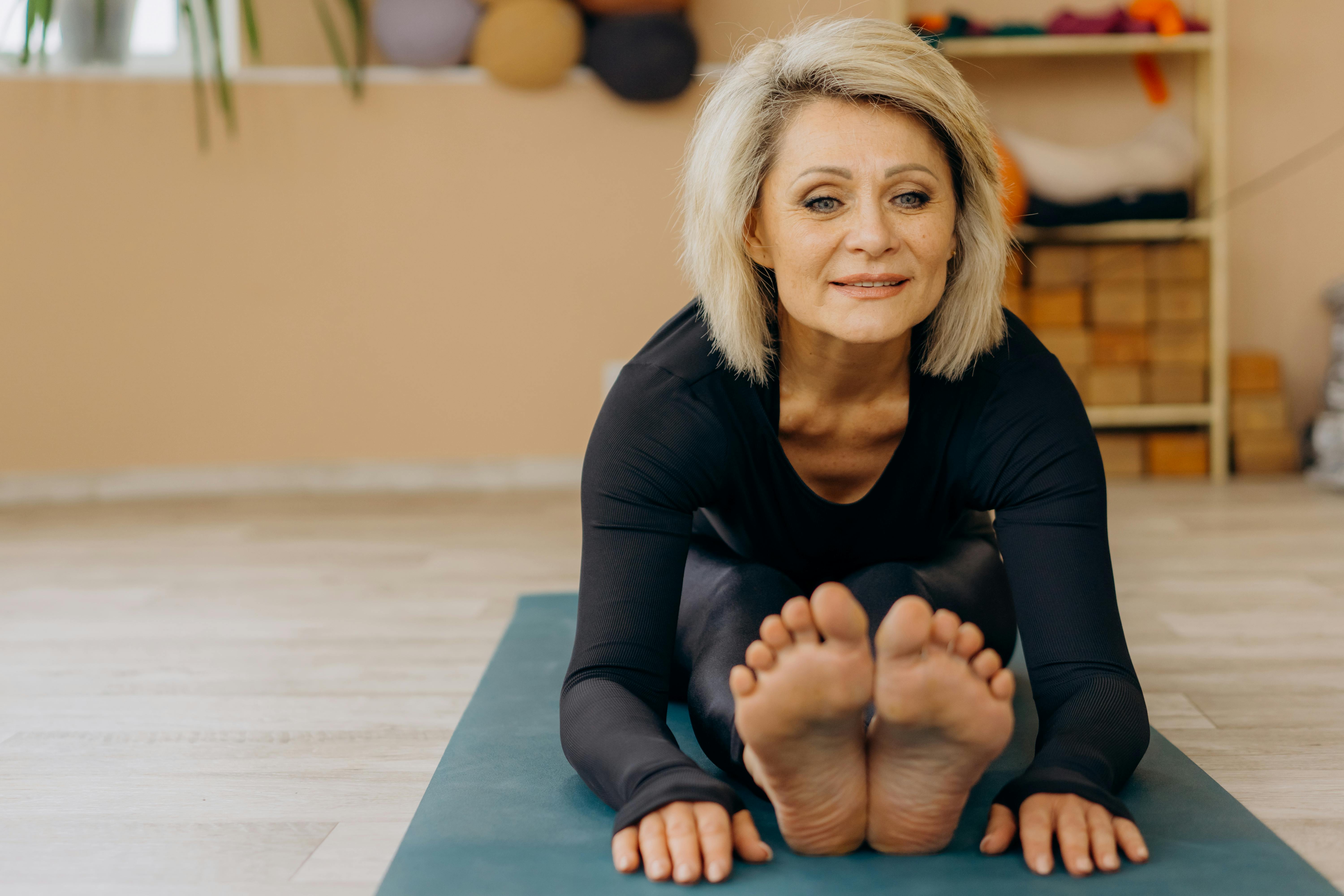 A woman doing yoga exercise | Source: Pexels