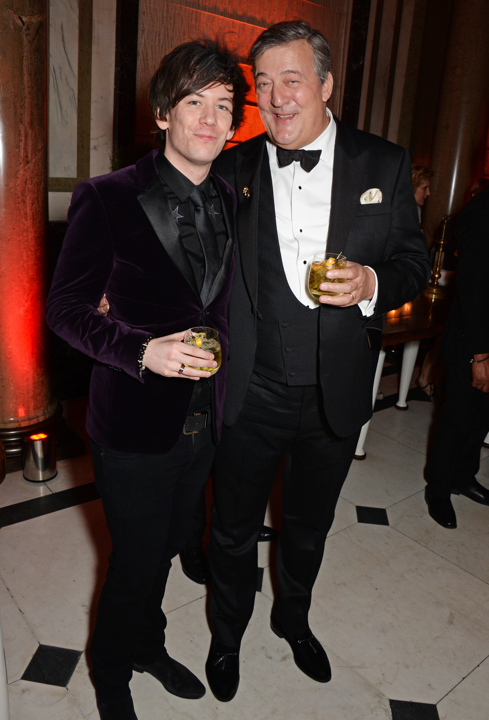 Stephen Fry and Elliott Spencer at the 2015 BAFTA after-party on February 8 in London, England. | Source: Getty Images