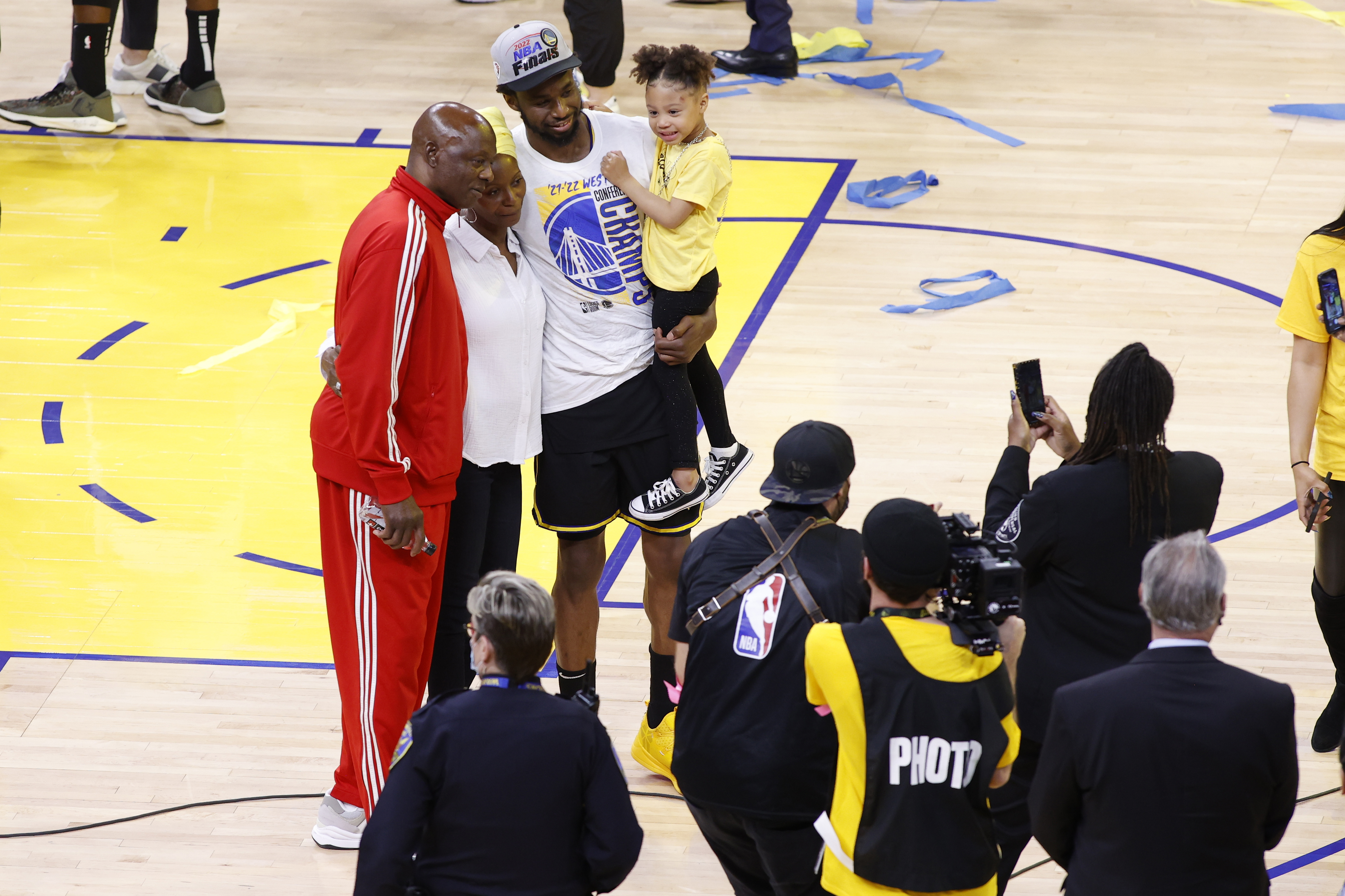 Andrew Wiggins #22 of the Golden State Warriors poses for a photo with his family after winning Game 5 of the 2022 NBA Playoffs Western Conference Finals on May 26, 2022 at Chase Center, in San Francisco, California. | Source: Getty Images