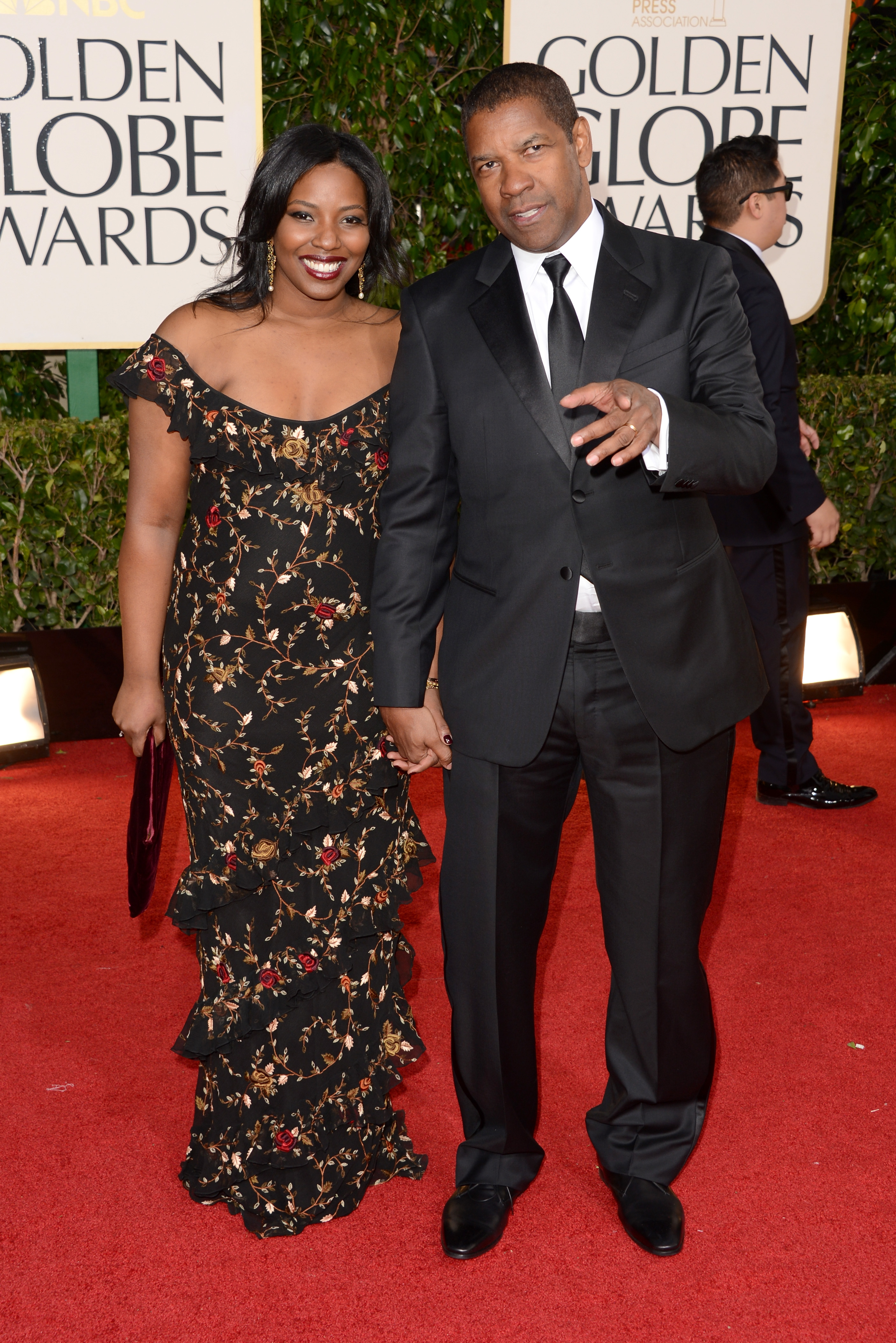 Denzel Washington and his daughter Olivia at the 70th Annual Golden Globe Awards in Beverly Hills, California on January 13, 2013 | Source: Getty Images