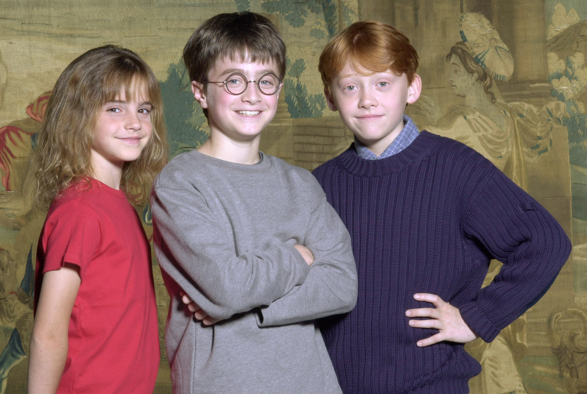 Daniel Radcliffe, center, has been named as the actor who will play Harry Potter, in the upcoming film alongside Rupert Grint, right, and Emma Watson, in a post dated August 21, 2000  | Source: Getty Images