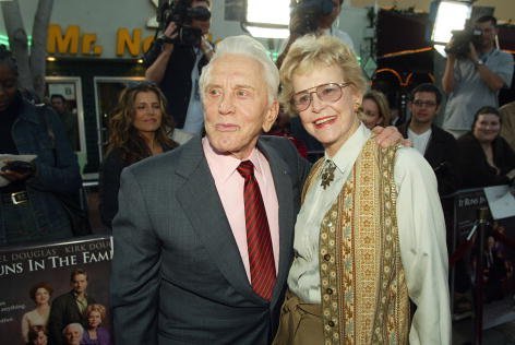 Kirk Douglas (L) poses with actress and ex-wife Diana Douglas at the premiere of "It Runs In The Family" at the Bruin Theater on April 7, 2003, in Los Angeles, California. | Source: Getty Images.