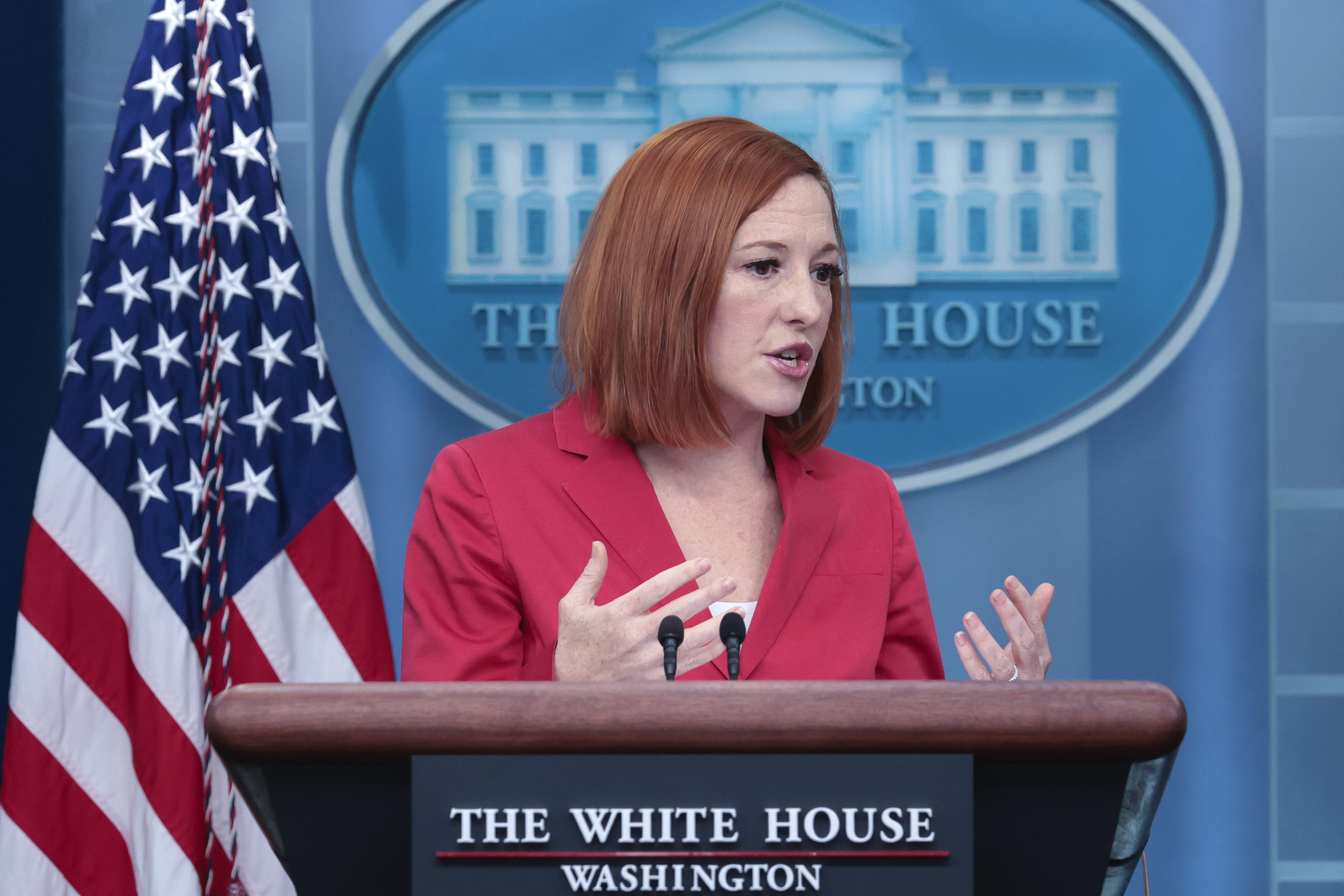 White House press secretary Jen Psaki answers questions at a daily briefing in March 2022, in Washington, DC. | Source: Getty Images
