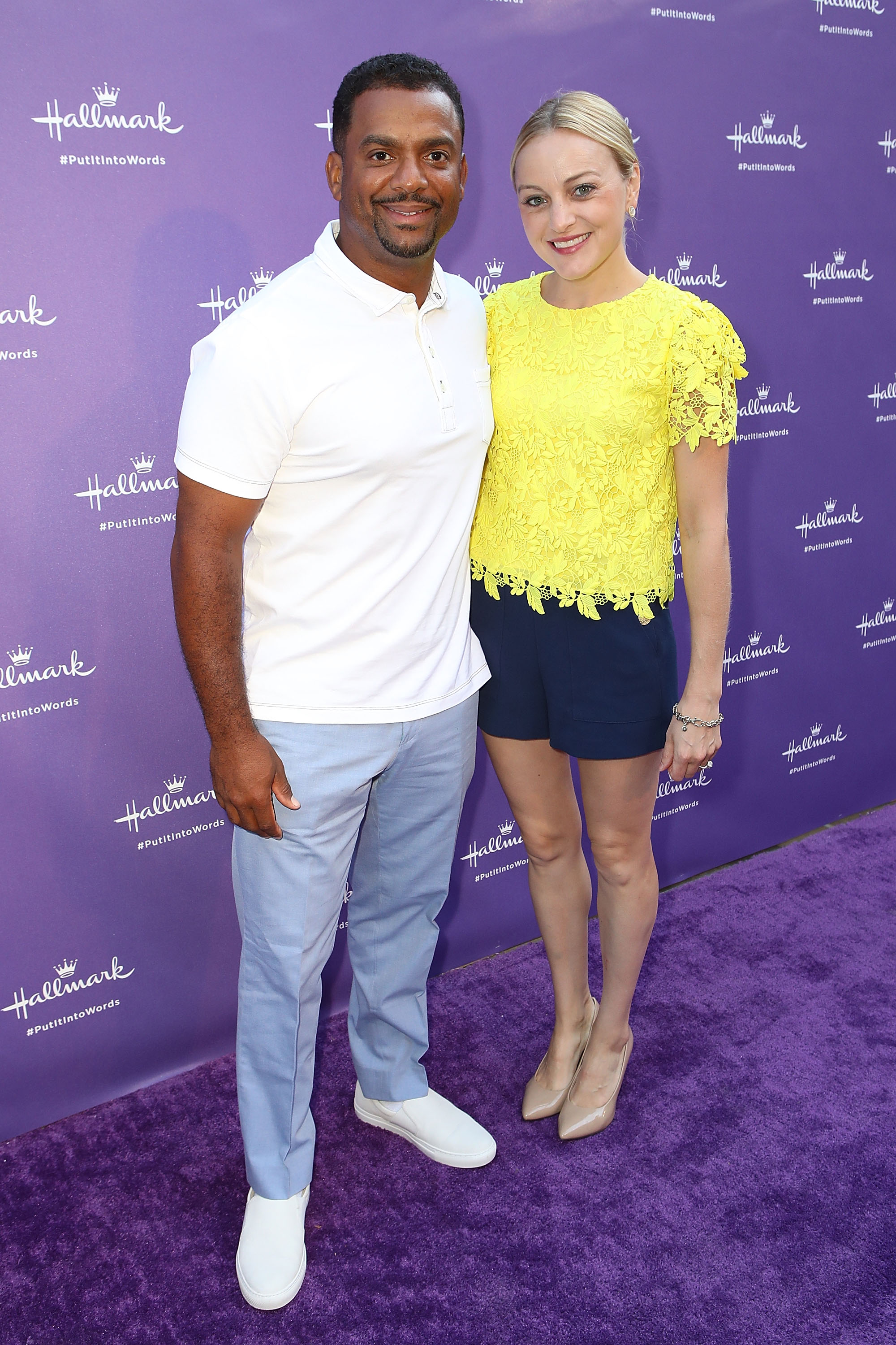 Alfonso Ribeiro and Angela Unkrich arrive at Hallmark's When You Care Enough to Put It Into Words Launch Event on July 30, 2018 | Source: Getty Images