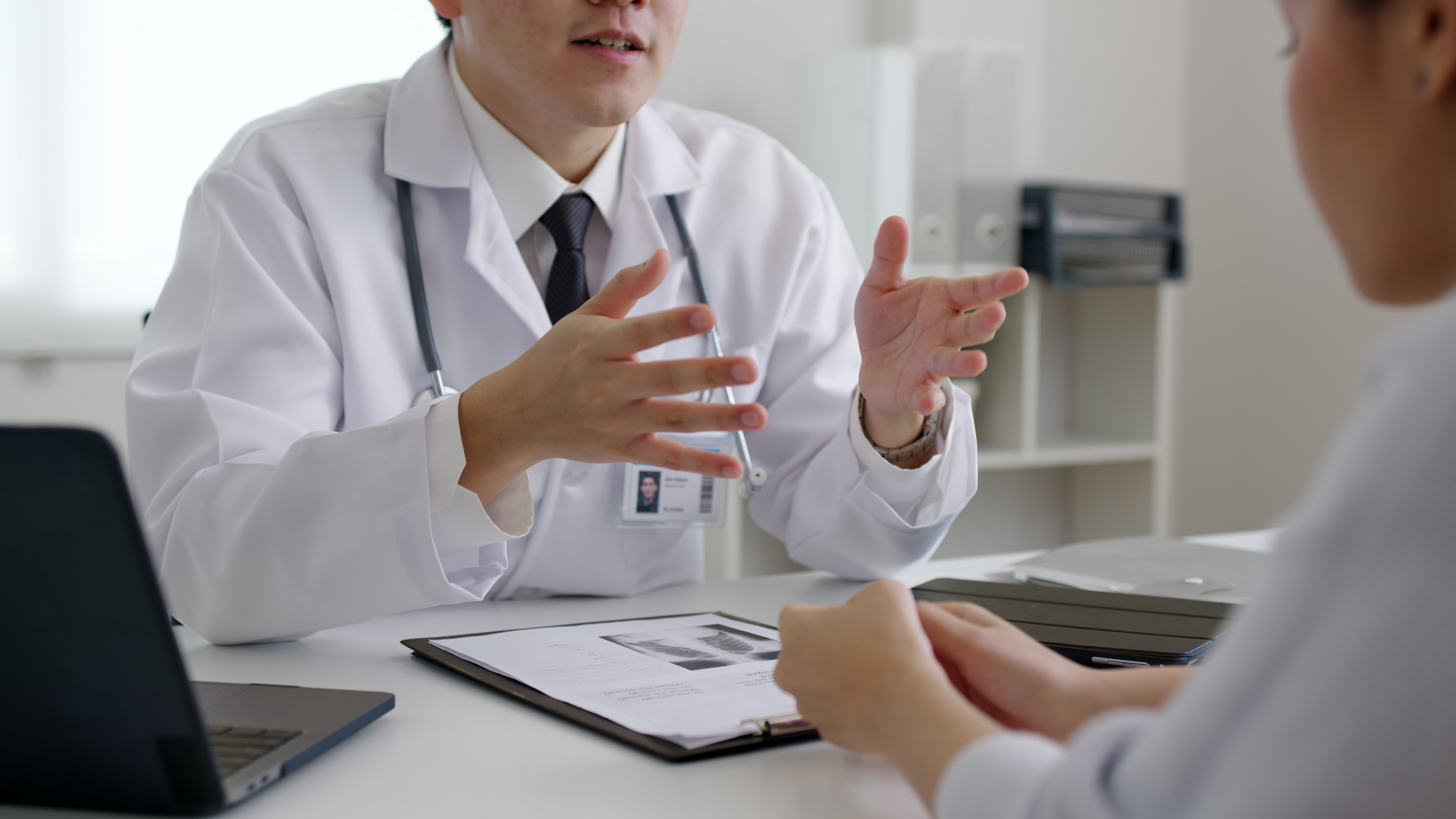 Woman seeing a doctor | Source: Shutterstock