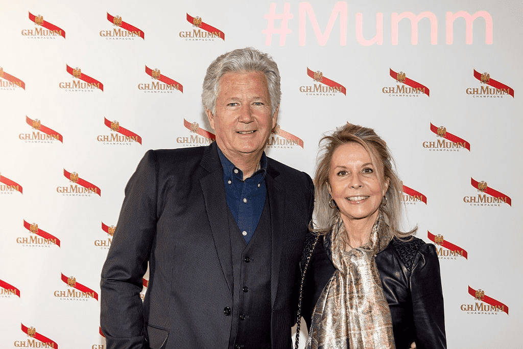 Pierre Dhostel et son épouse Carole Bellemare assistent à la fête du Grand Cordon Mumm au YoYo Club après le Championnat FIA de Formule E 2016 - Prix Paris E, le 23 avril 2016 à Paris, France. | Photo : Getty Images Pierre Dhostel et son épouse Carole Bellemare assistent à la fête du Grand Cordon Mumm au YoYo Club après le Championnat FIA de Formule E 2016 - Prix Paris E, le 23 avril 2016 à Paris, France. | Photo : Getty Images