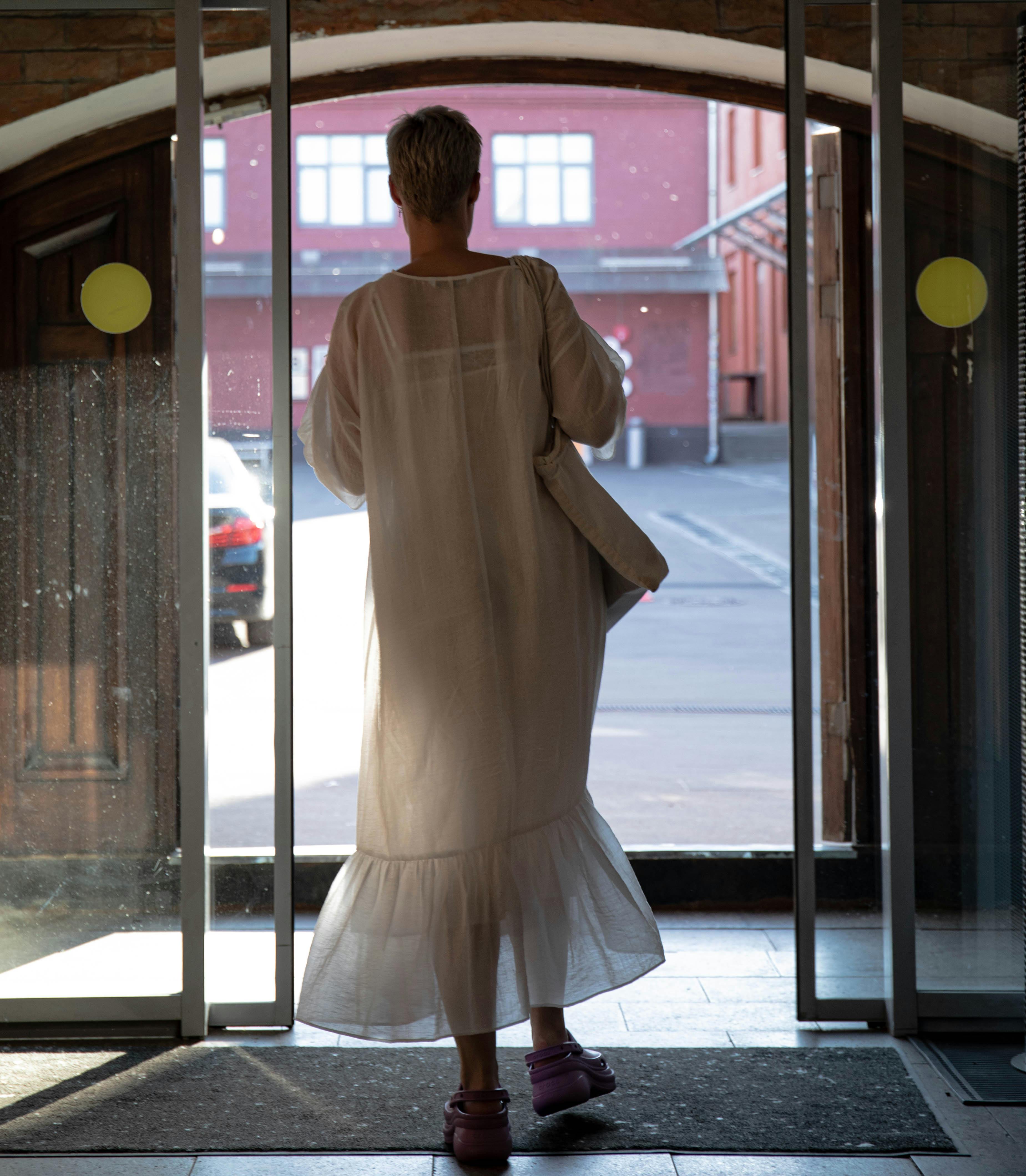 A woman leaving a venue | Source: Pexels
