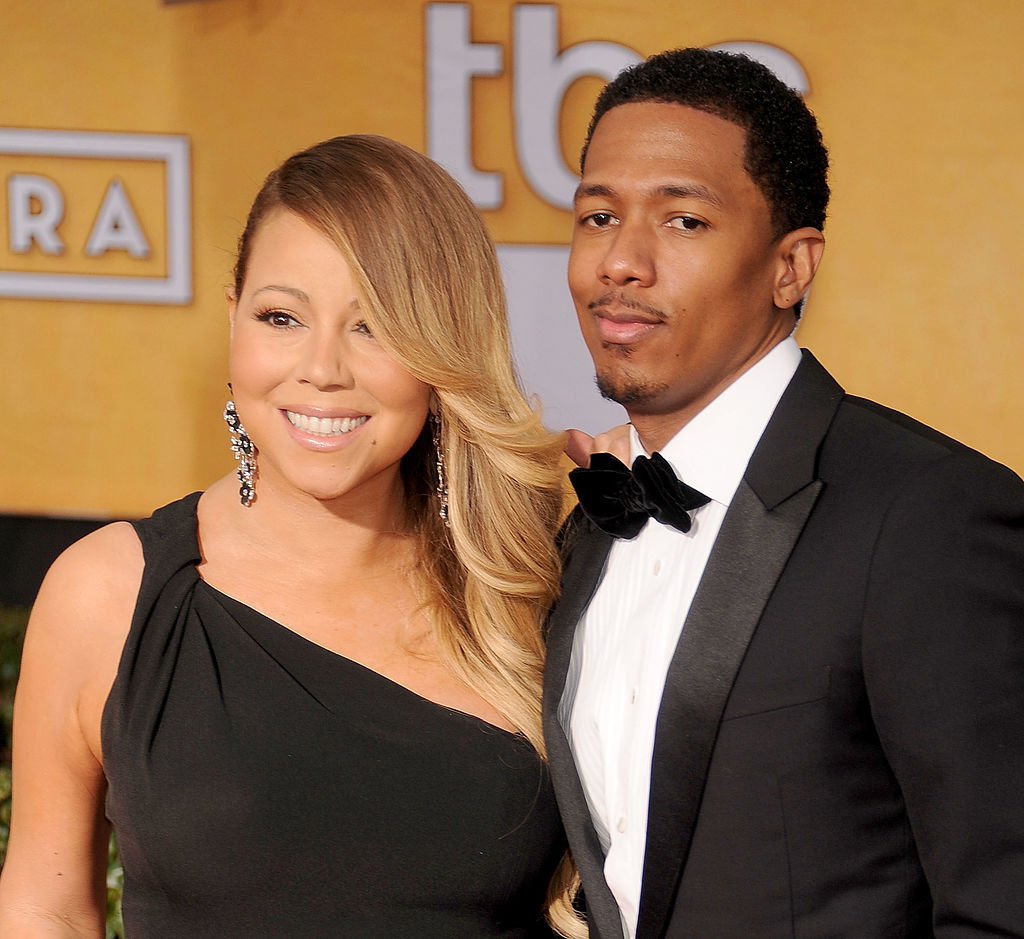 Singer Mariah Carey and actor/TV personality Nick Cannon arrive at the 20th Annual Screen Actors Guild Awards on January 18, 2014 in Los Angeles, California. | Source: Getty Images