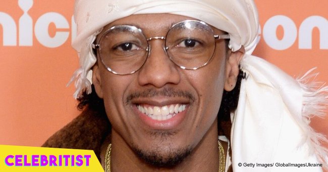 Nick Cannon and 1-year-old son Golden strike the same pose in adorable picture