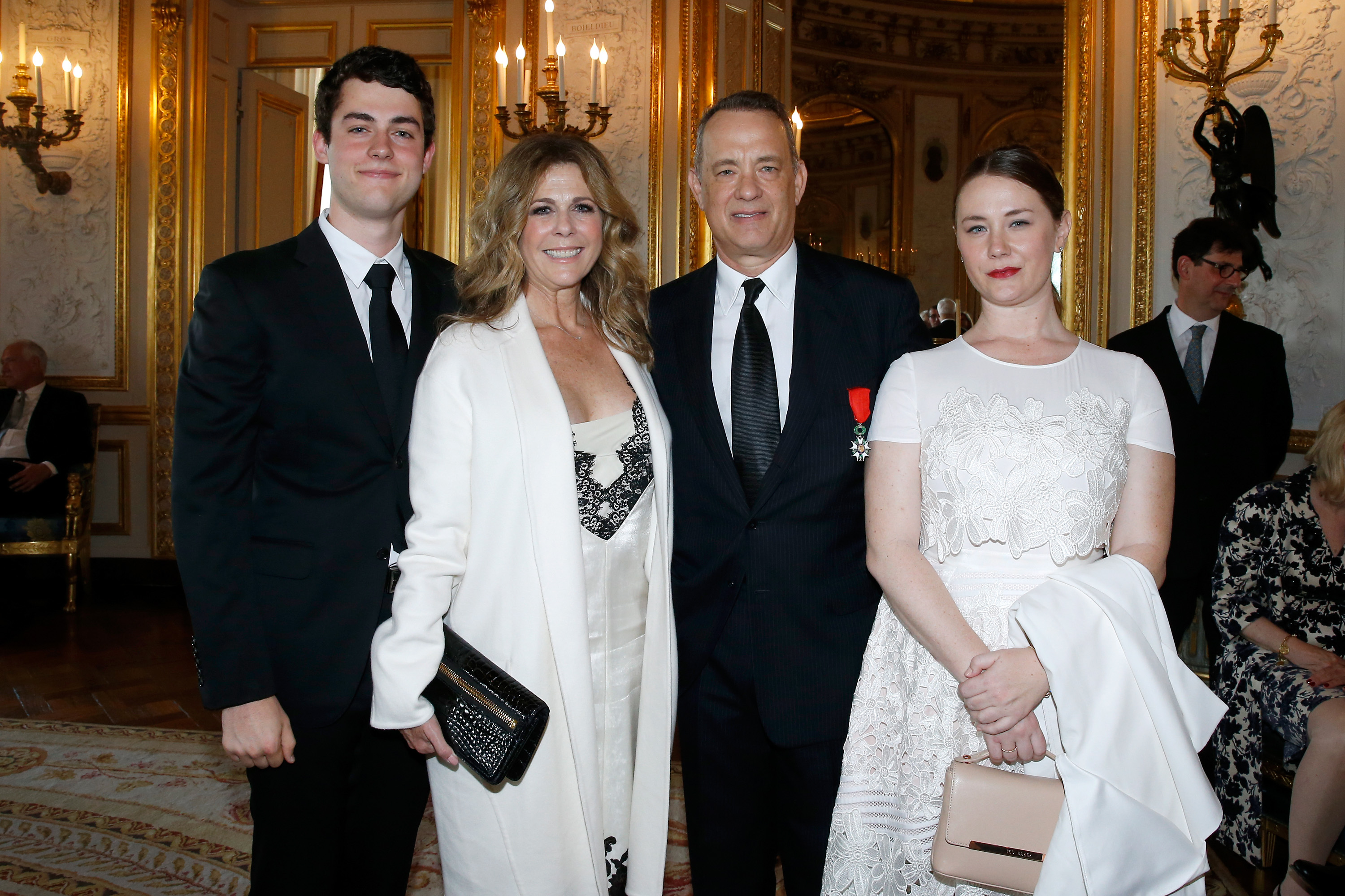 Truman, Rita Wilson, Tom, and Elizabeth Hanks attend Tom Hanks, Tom Brokaw & Gordon "Nick" Mueller receive the Legion d'Honneur Medal on May 19, 2016, in Paris, France. | Source: Getty Images