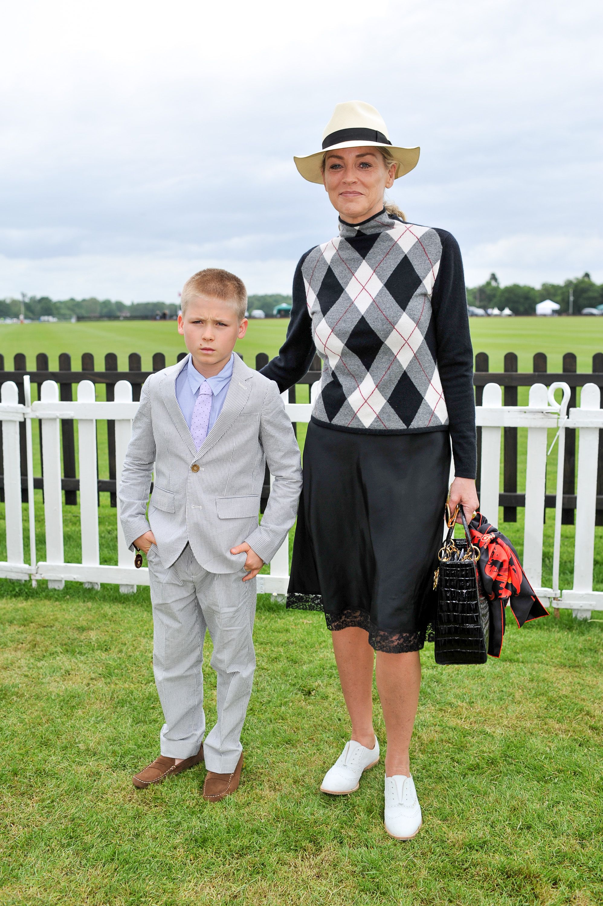Sharon Stone and son Roan at the Cartier Queen's Cup final in 2013 in Egham, England | Source: Getty Images
