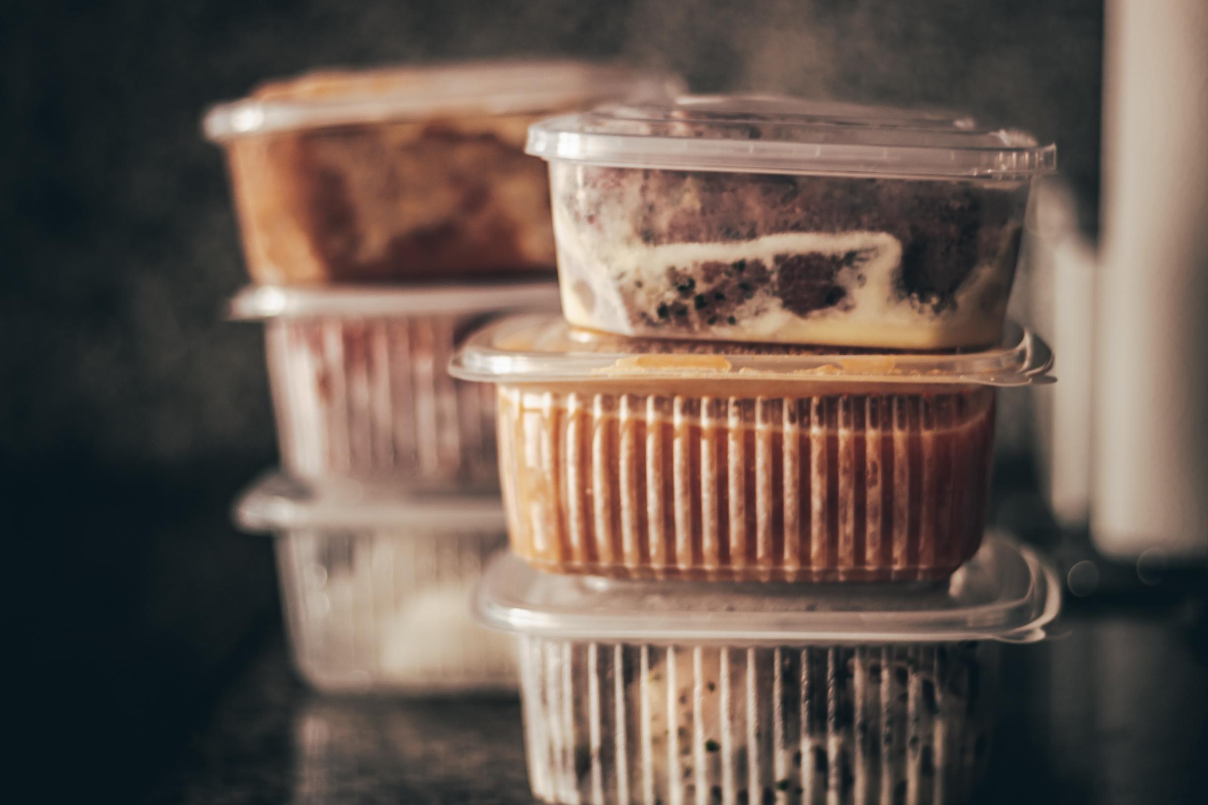 Plastic containers with frozen food | Source: Shutterstock